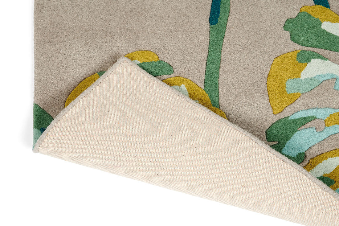Harlequin rug with a multicolour leaf pattern