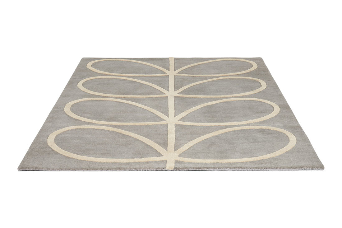 orla kiely giant linear stem rug - grey rug with a leaf design
