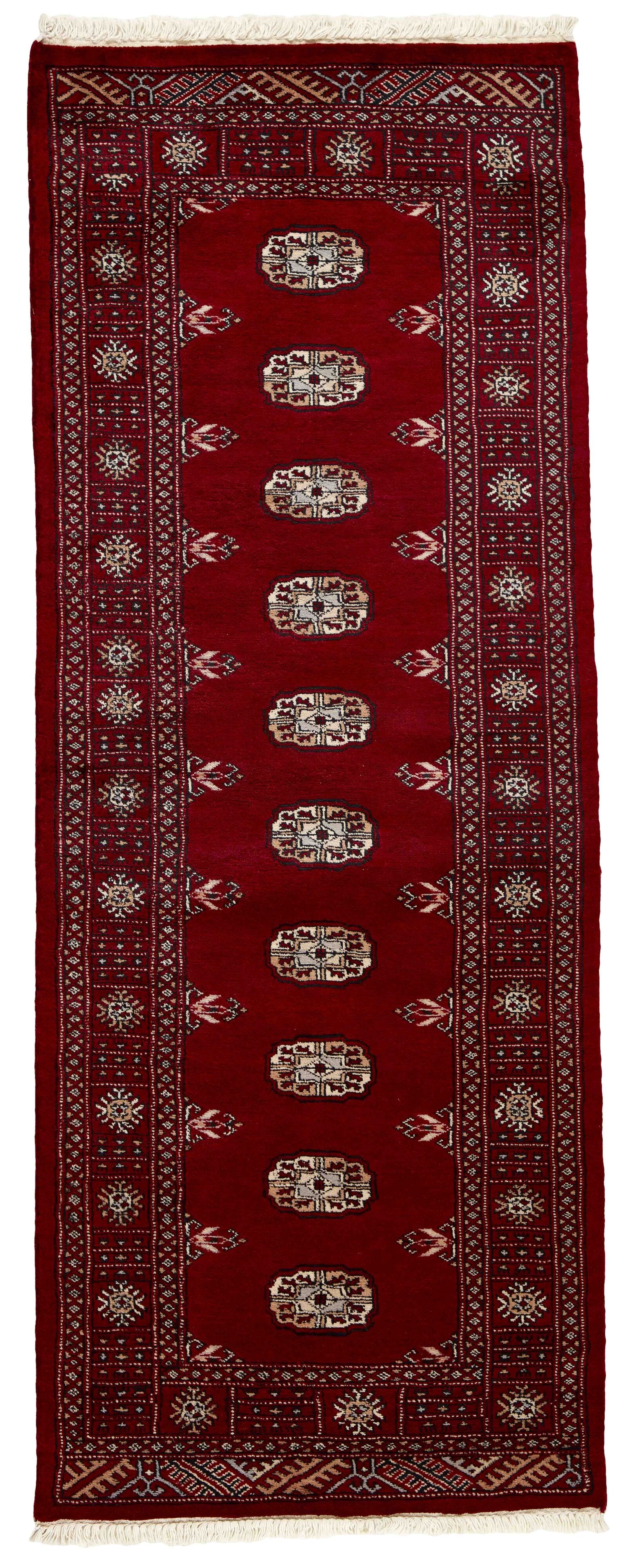 Red Oriental runner with traditional bordered pattern