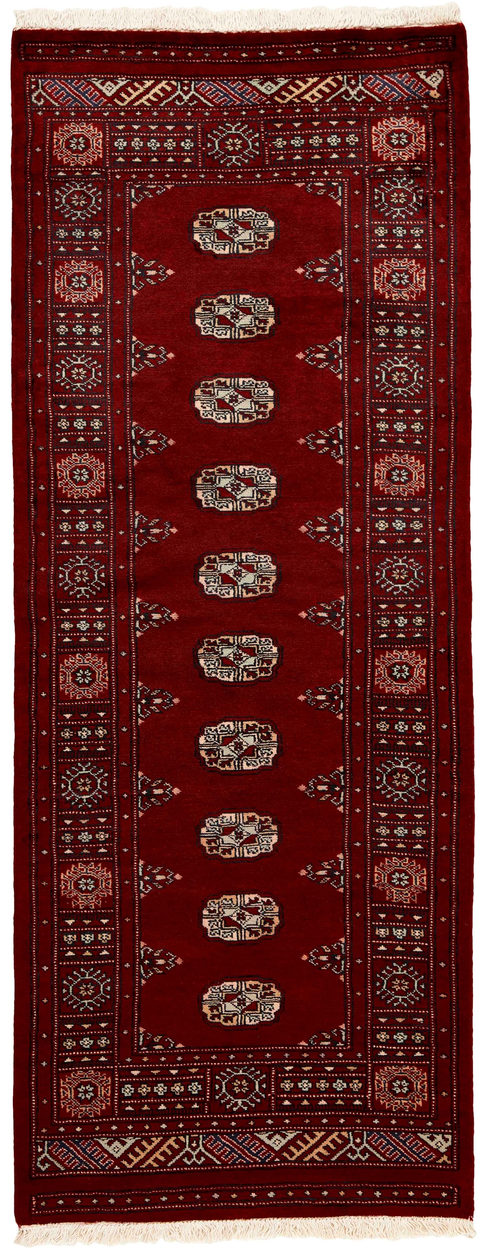 red oriental runner with traditional gul pattern