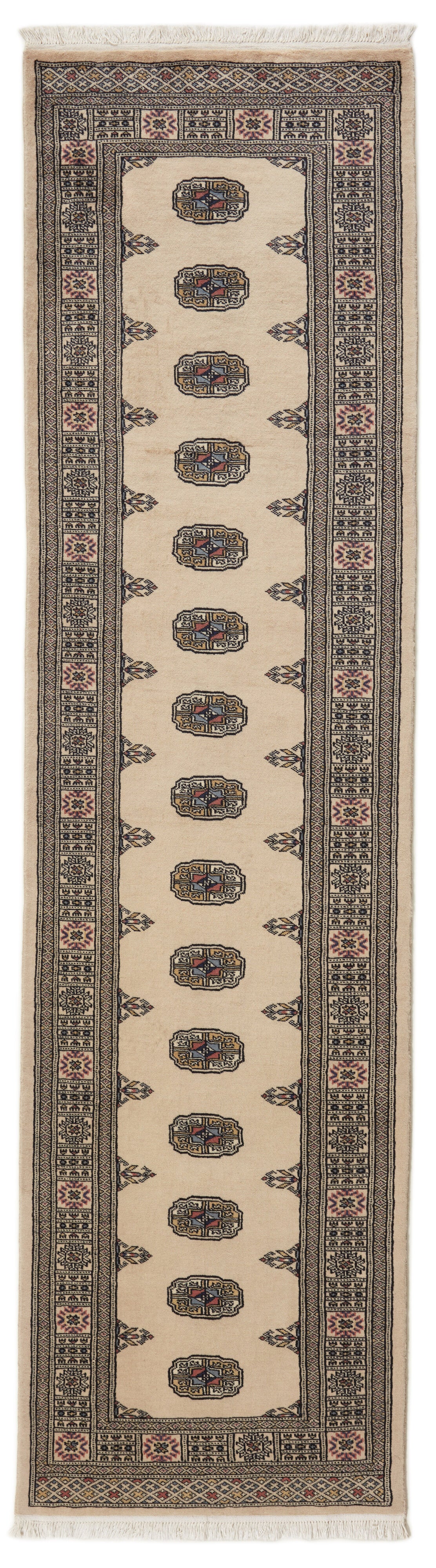 Beige Oriental runner with traditional bordered pattern