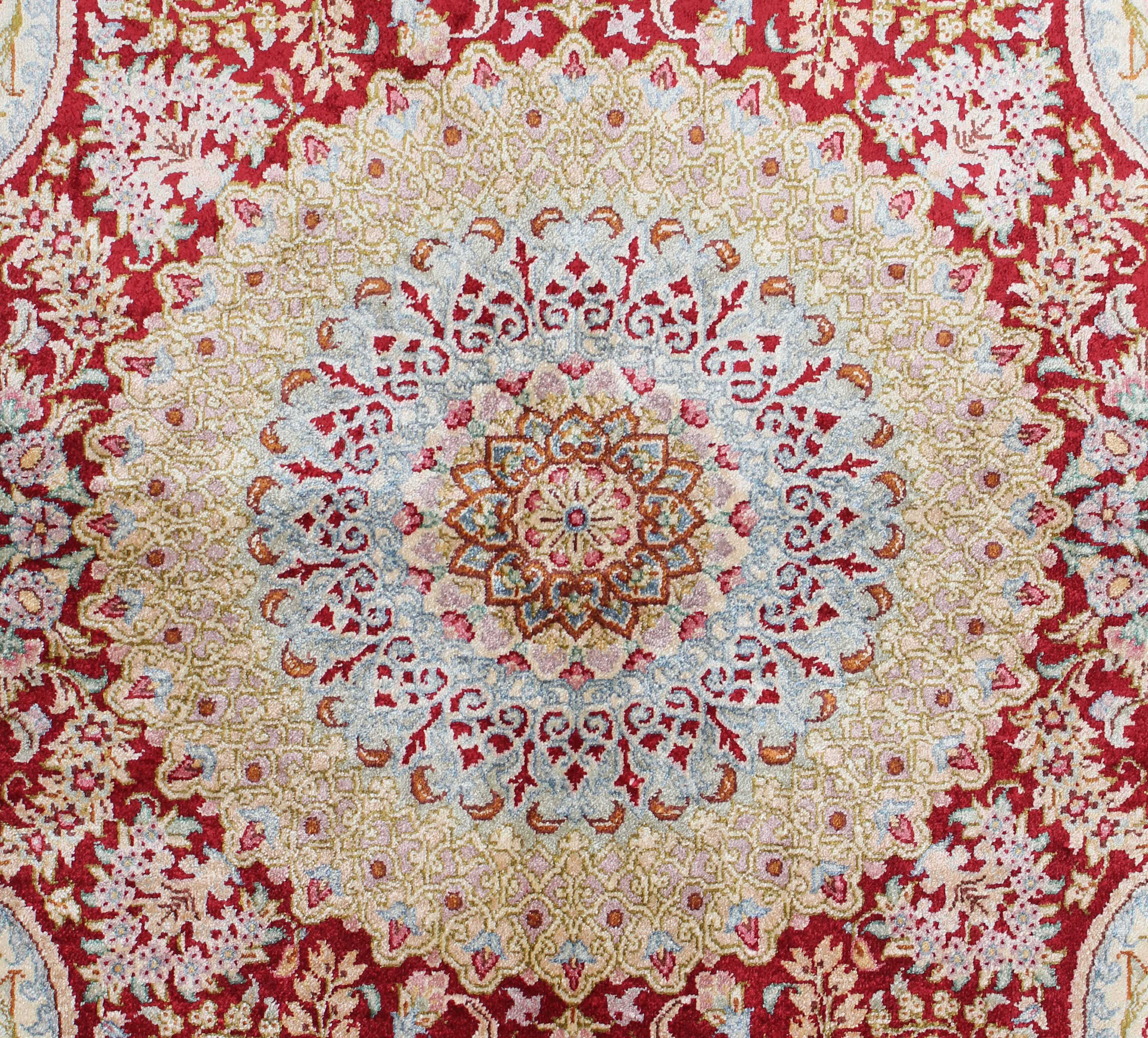 Authentic persian rug with a traditional design in red and beige