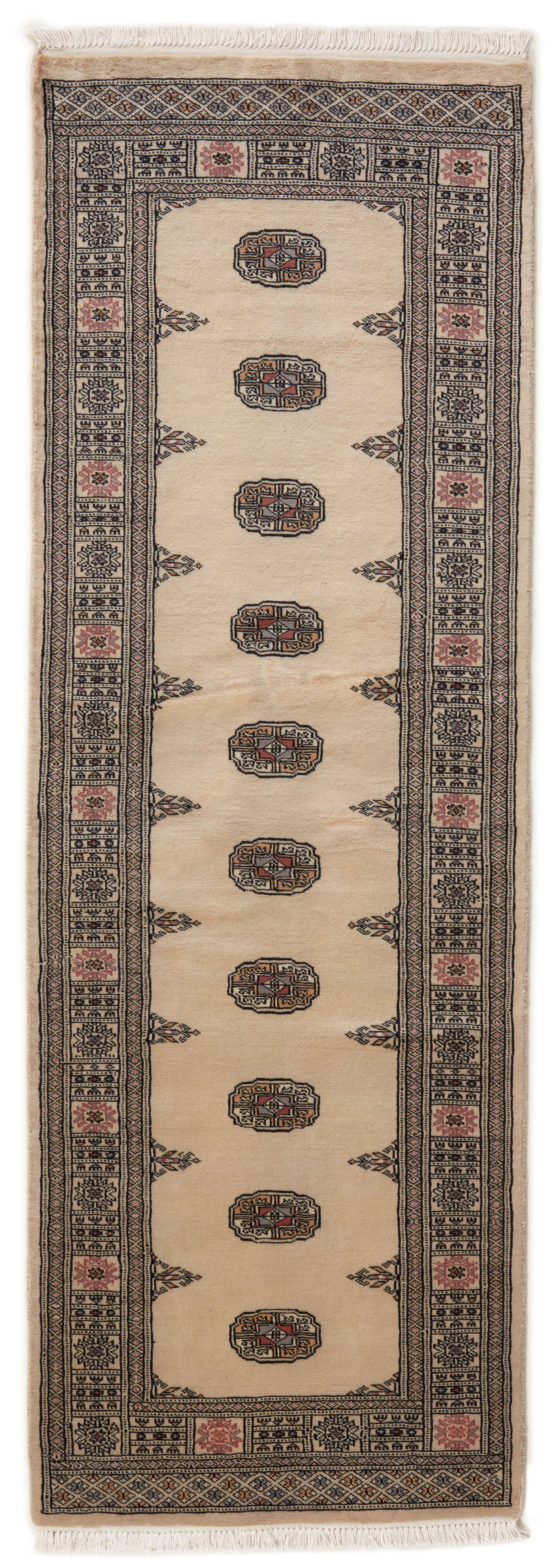 Beige Oriental runner with traditional bordered pattern