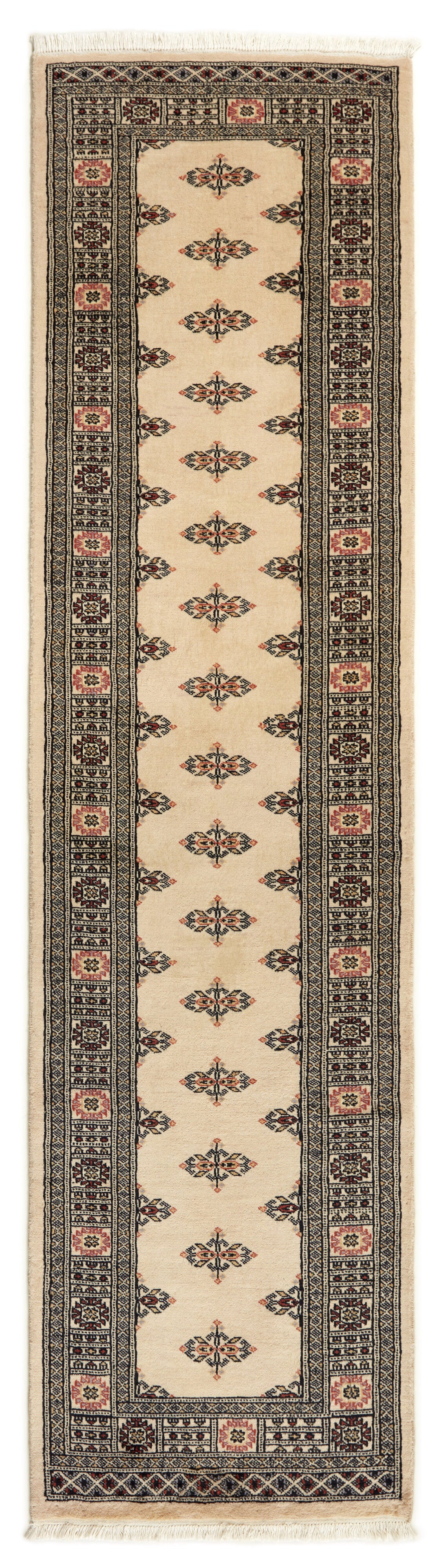 Beige Oriental runner with traditional bordered pattern