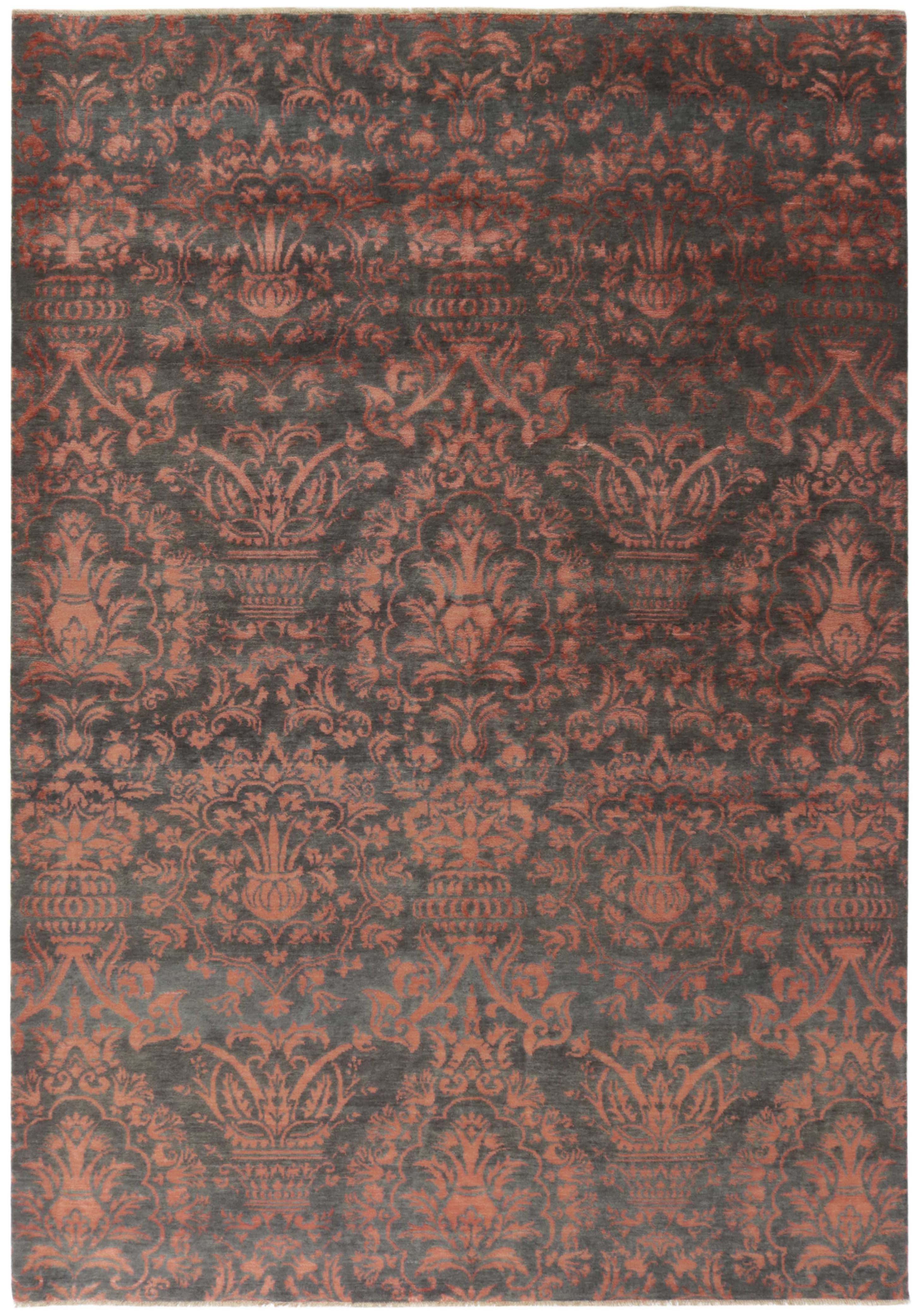 Polypropylene rug with geometric triangle pattern in grey, cream and orange
