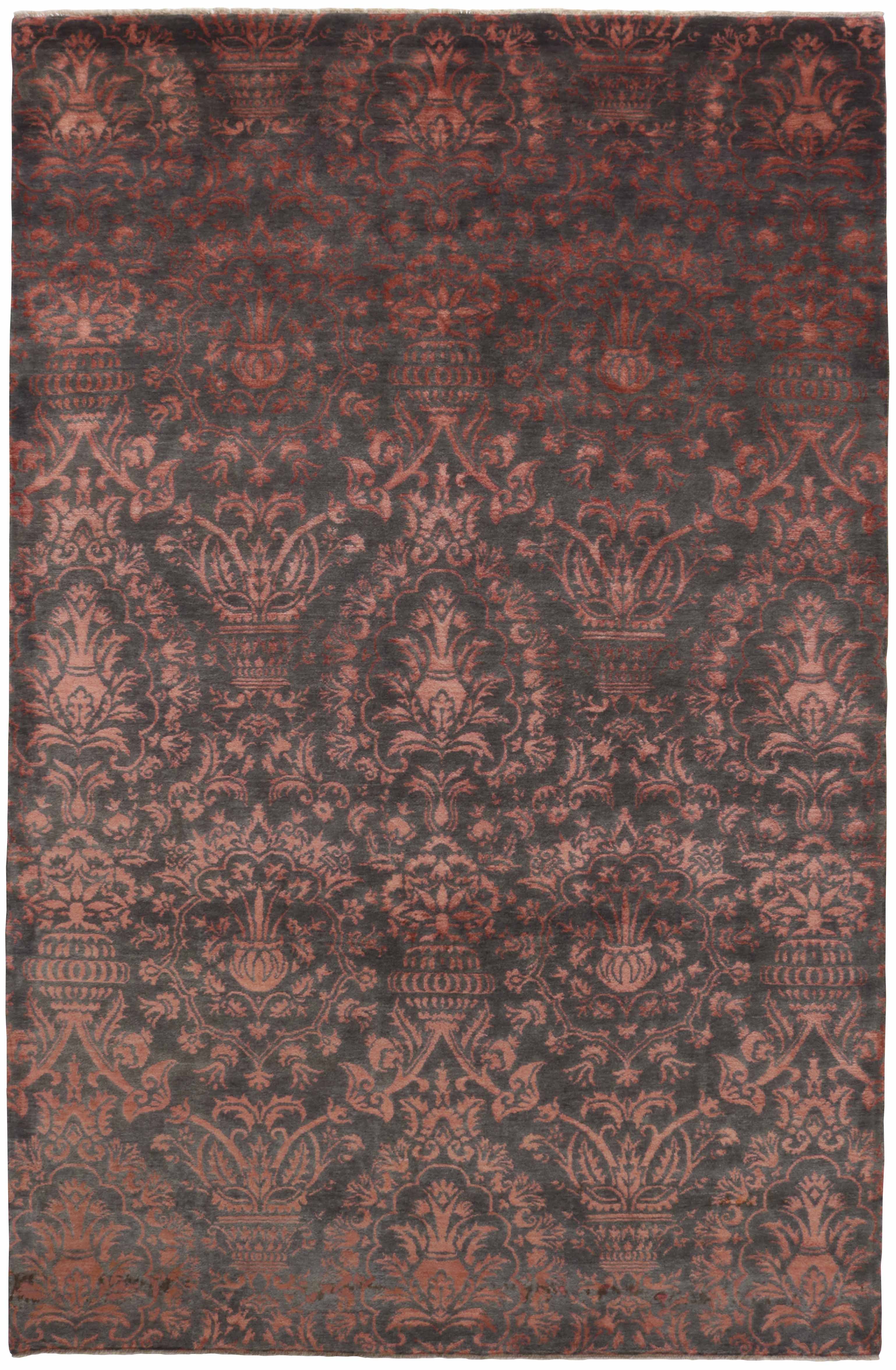 Rectangular natural beige rug with terracotta red, grey and black aztec design and black tassel border