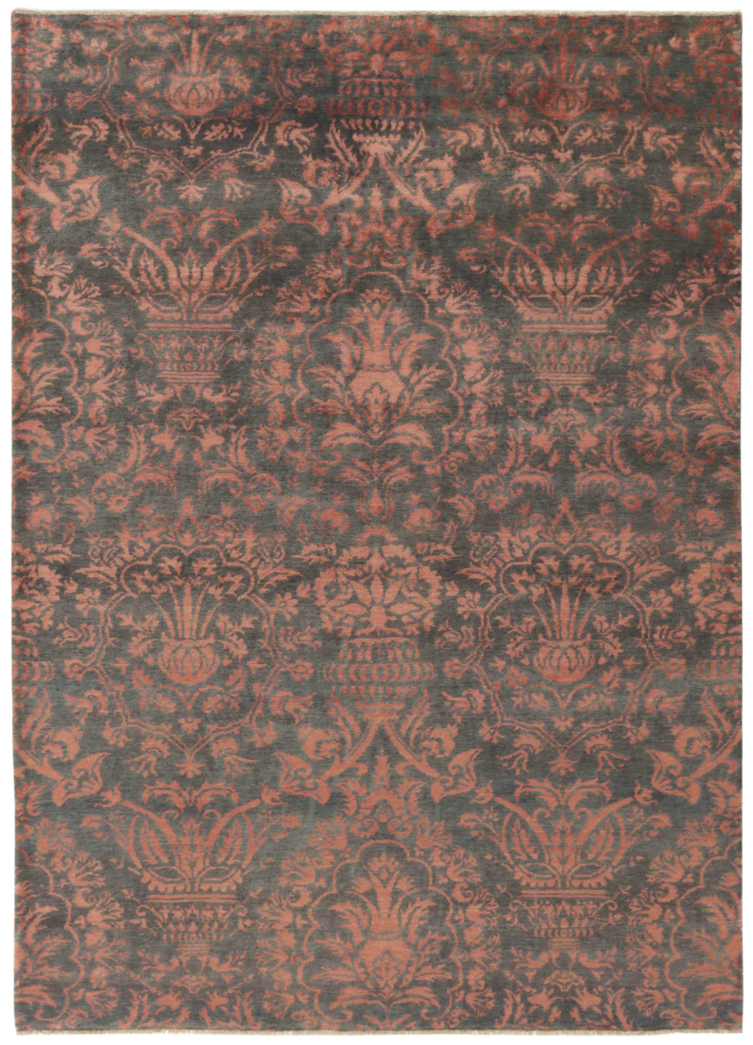 Rectangular natural beige rug with terracotta red, grey and black aztec design and black tassel border