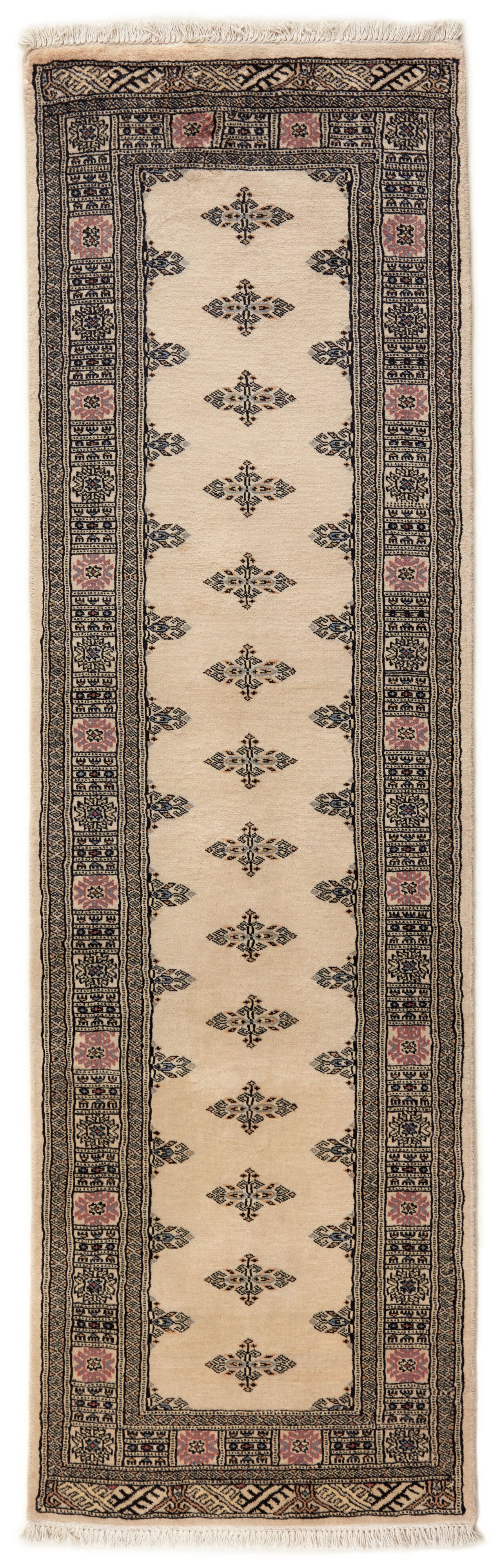 Beige Oriental runner with traditional bordered pattern
