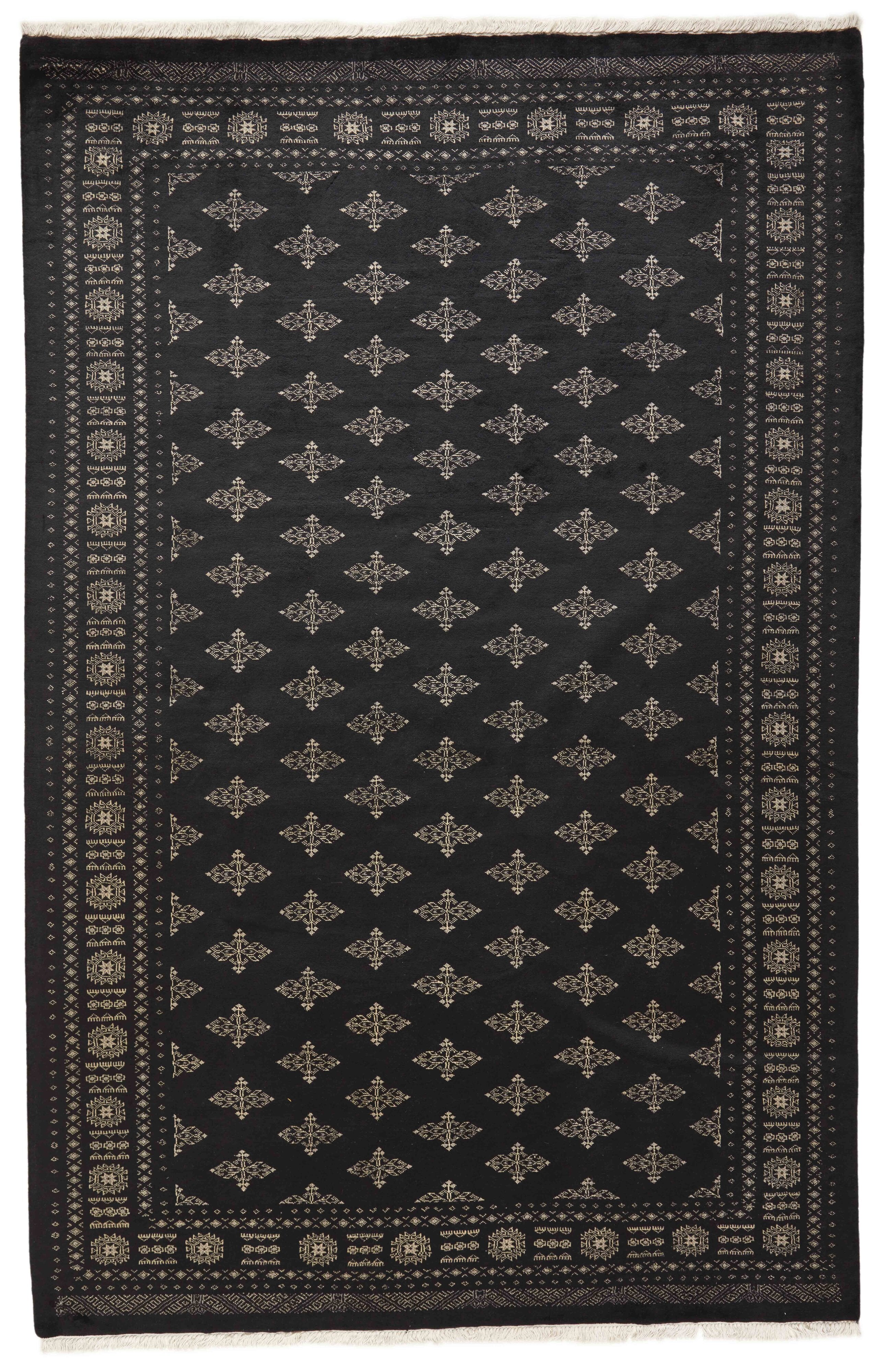 Black Oriental rug with traditional bordered pattern