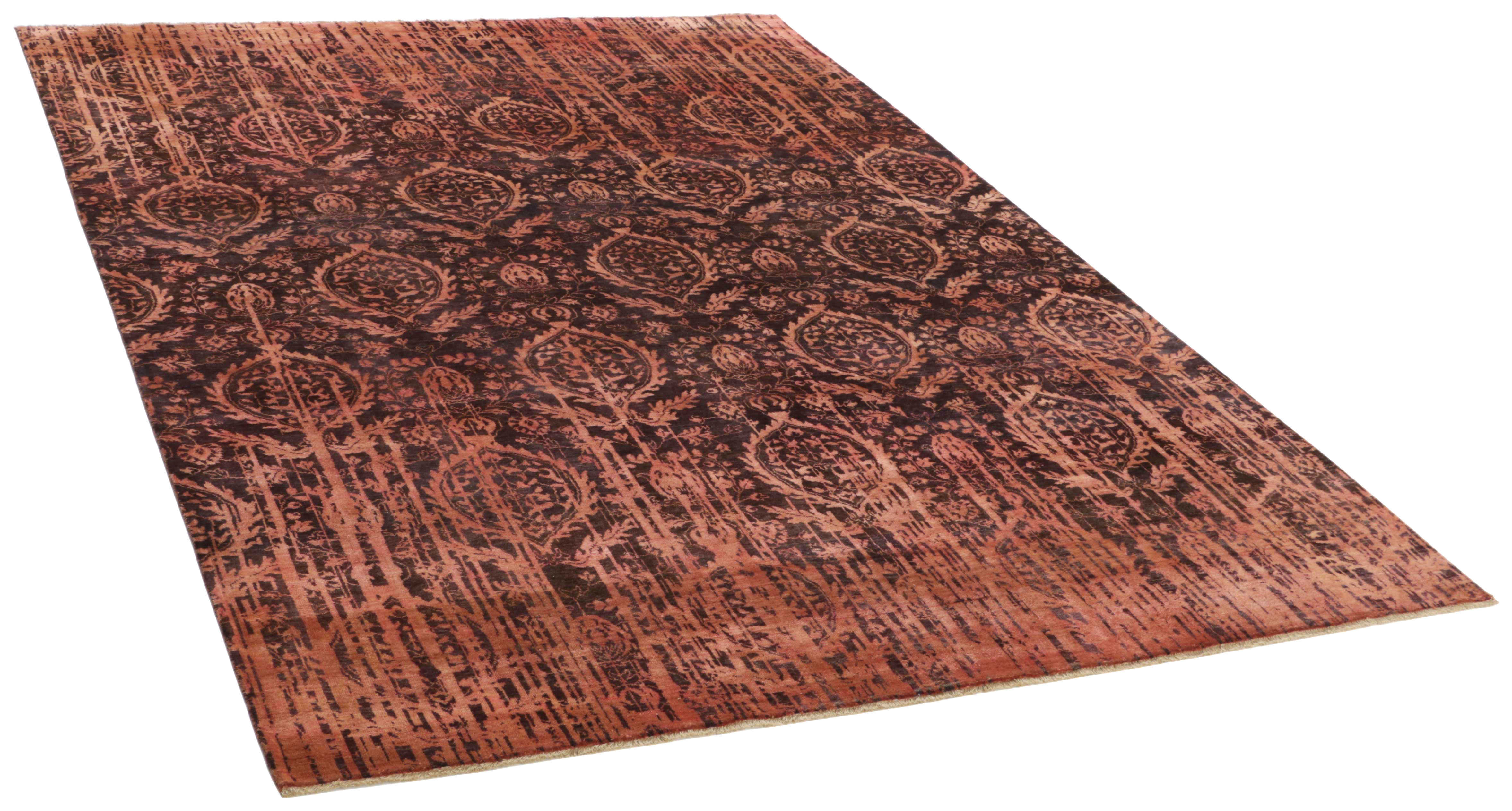 Authentic oriental rug with a damask pattern in red