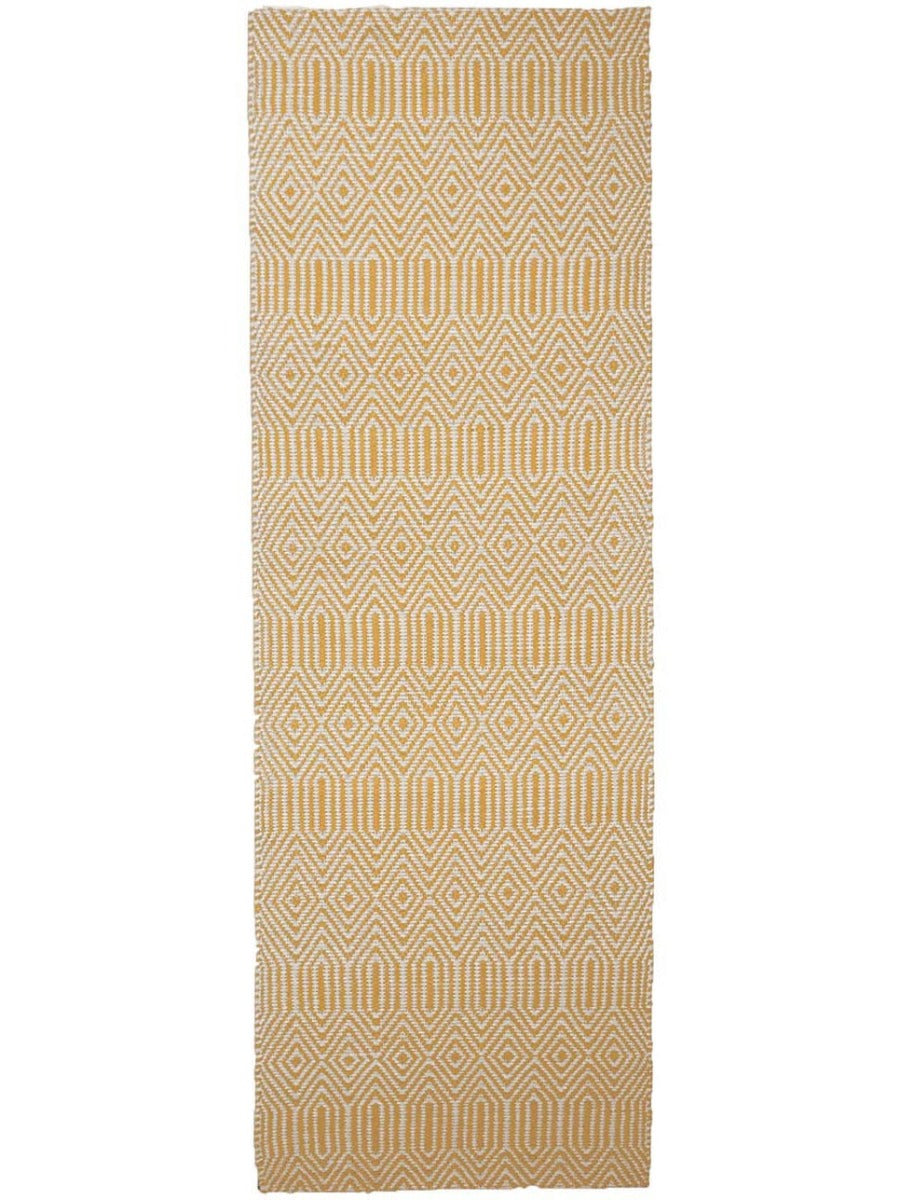 Mustard yellow and white woven runner with aztec chevron pattern