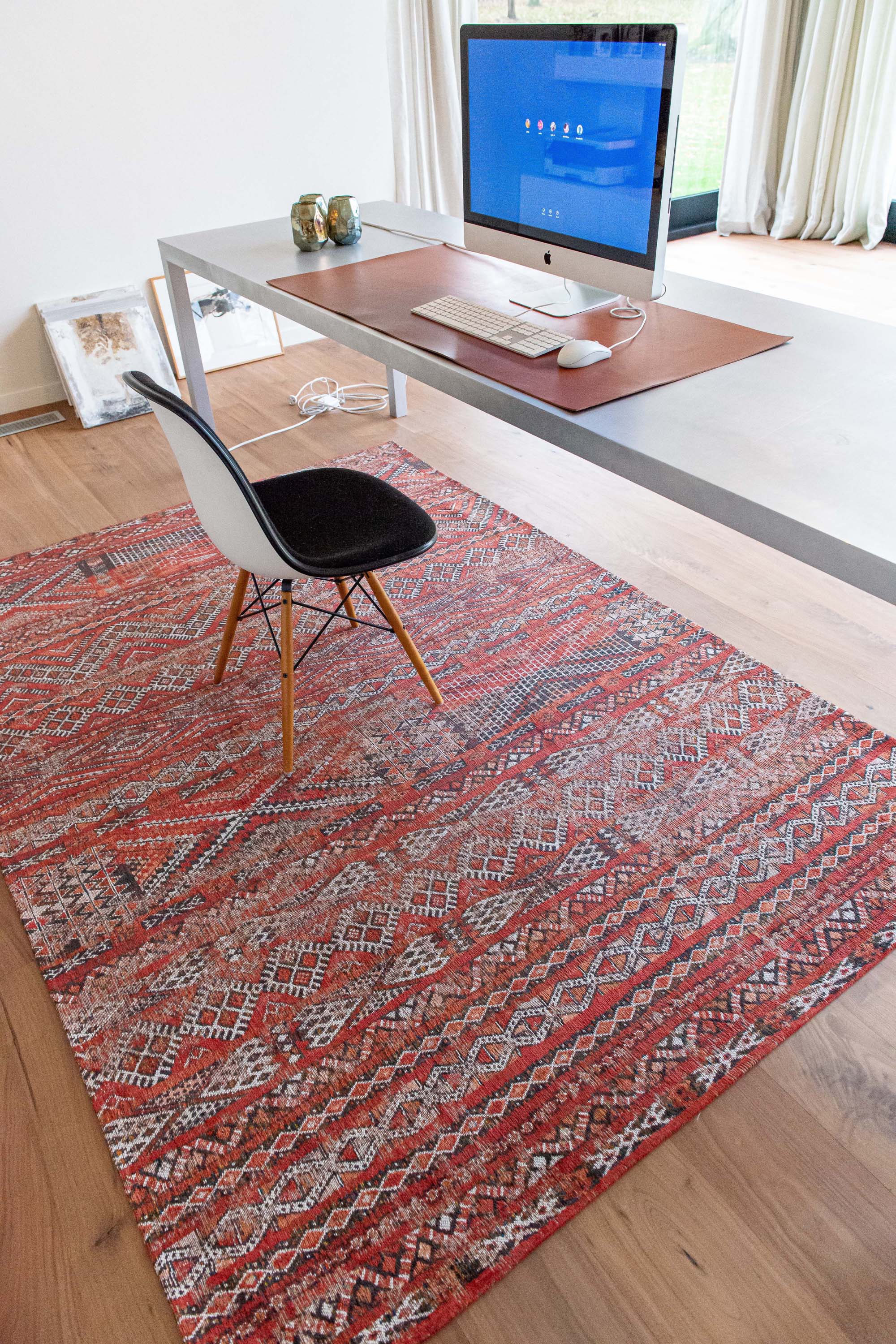 red rug with a moroccan geometric pattern
