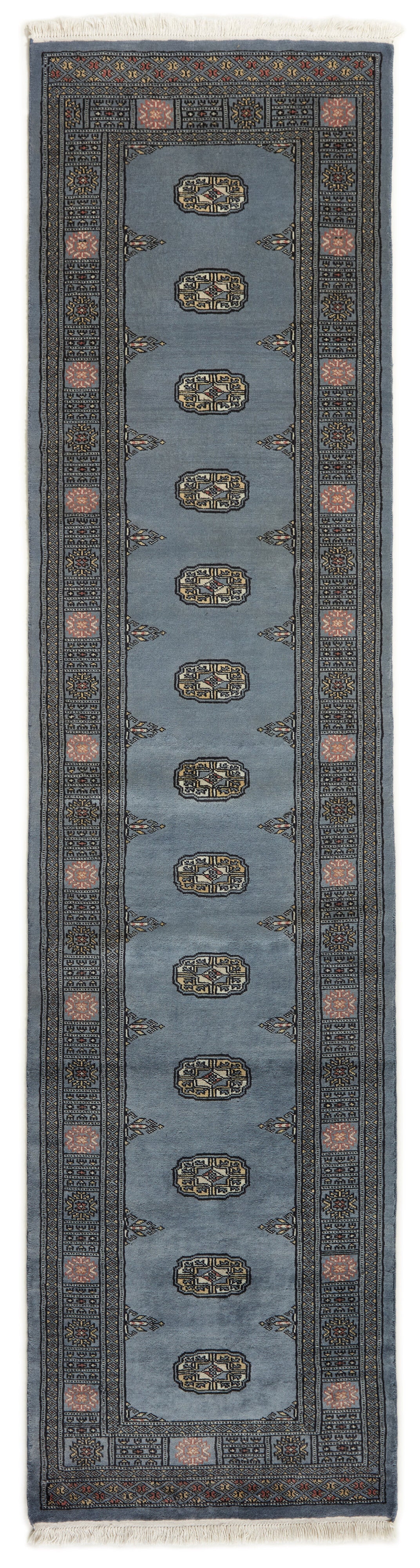 Blue Oriental runner with traditional bordered pattern