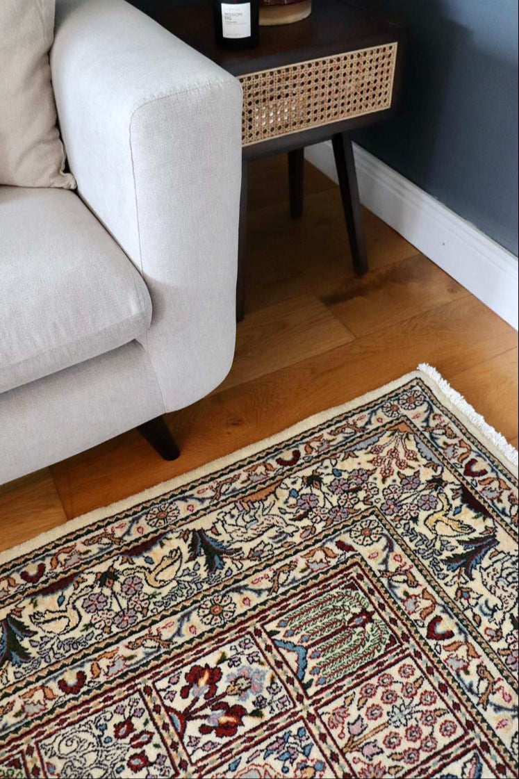 authentic persian rug with floral pattern in beige