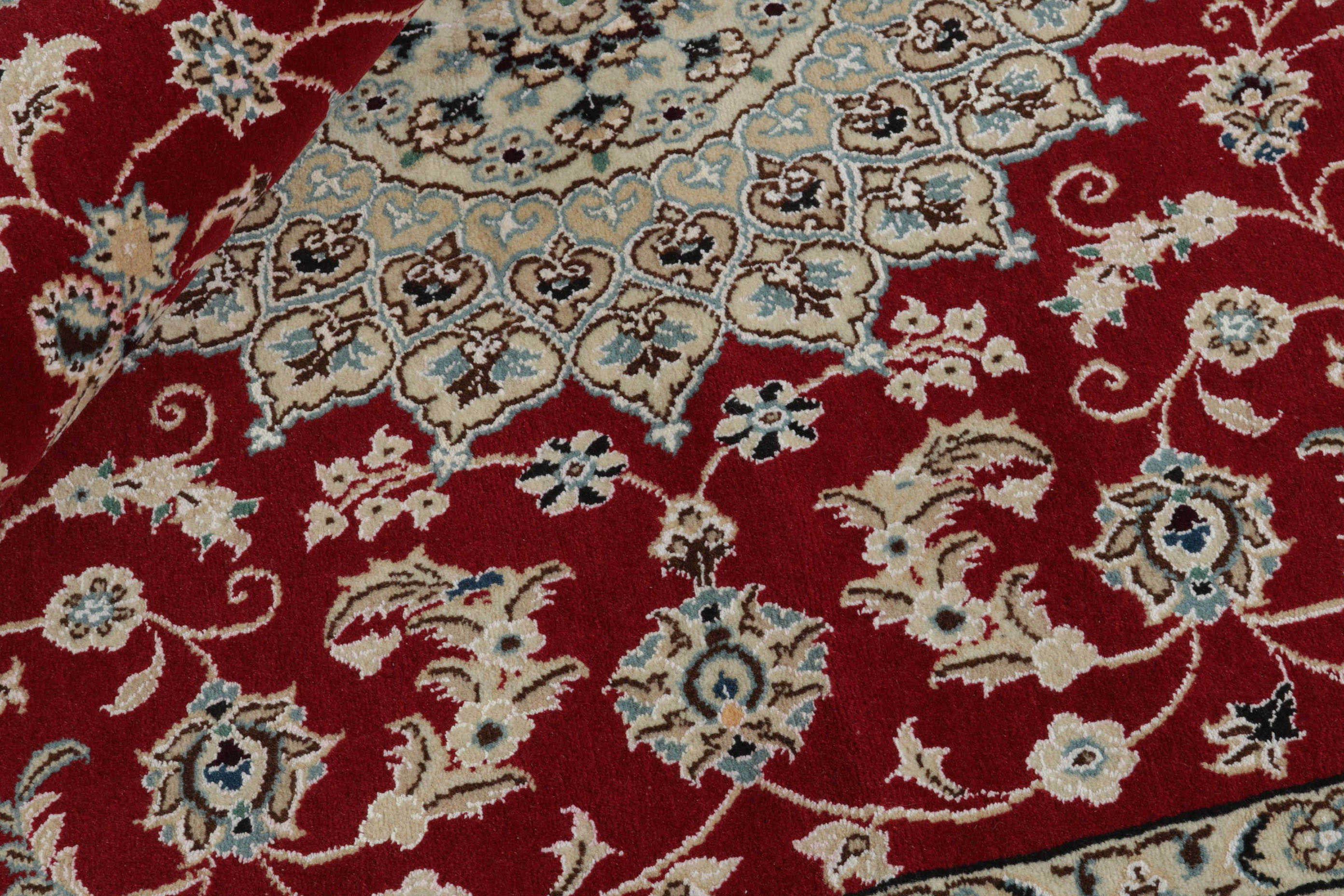 Authentic oriental rug with traditional floral design in red