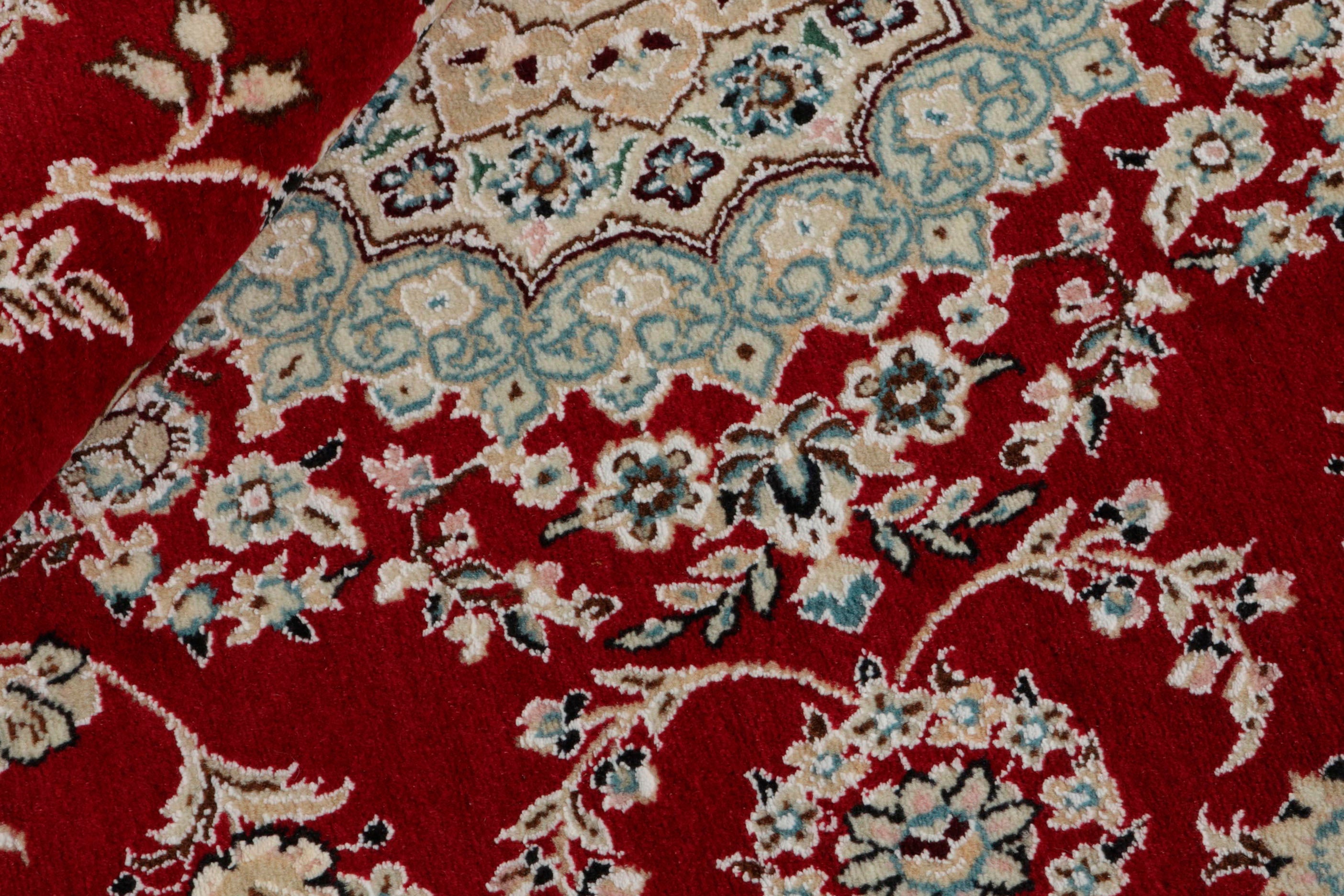 Authentic oriental rug with traditional floral design in red