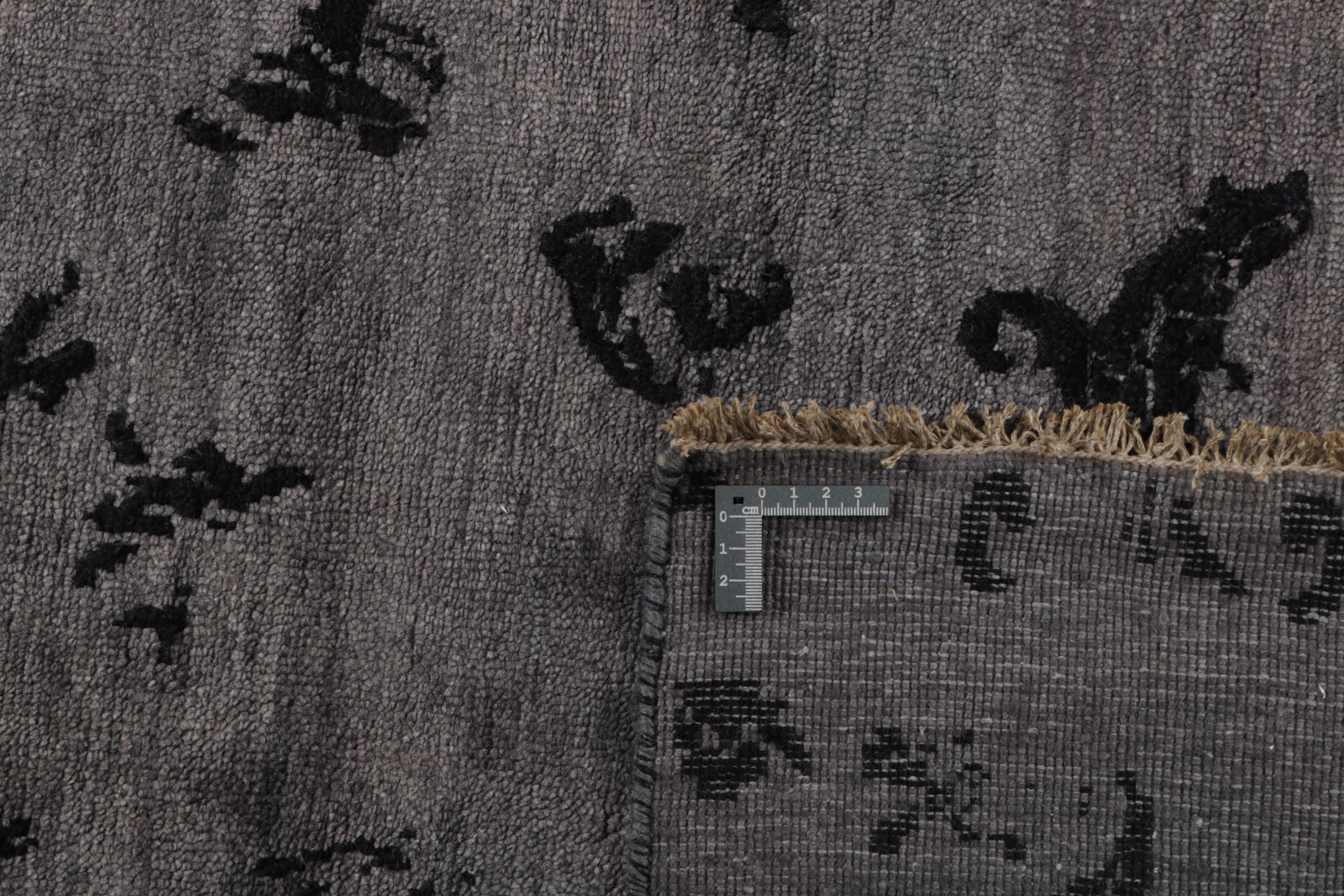 Authentic oriental rug with a damask pattern in grey