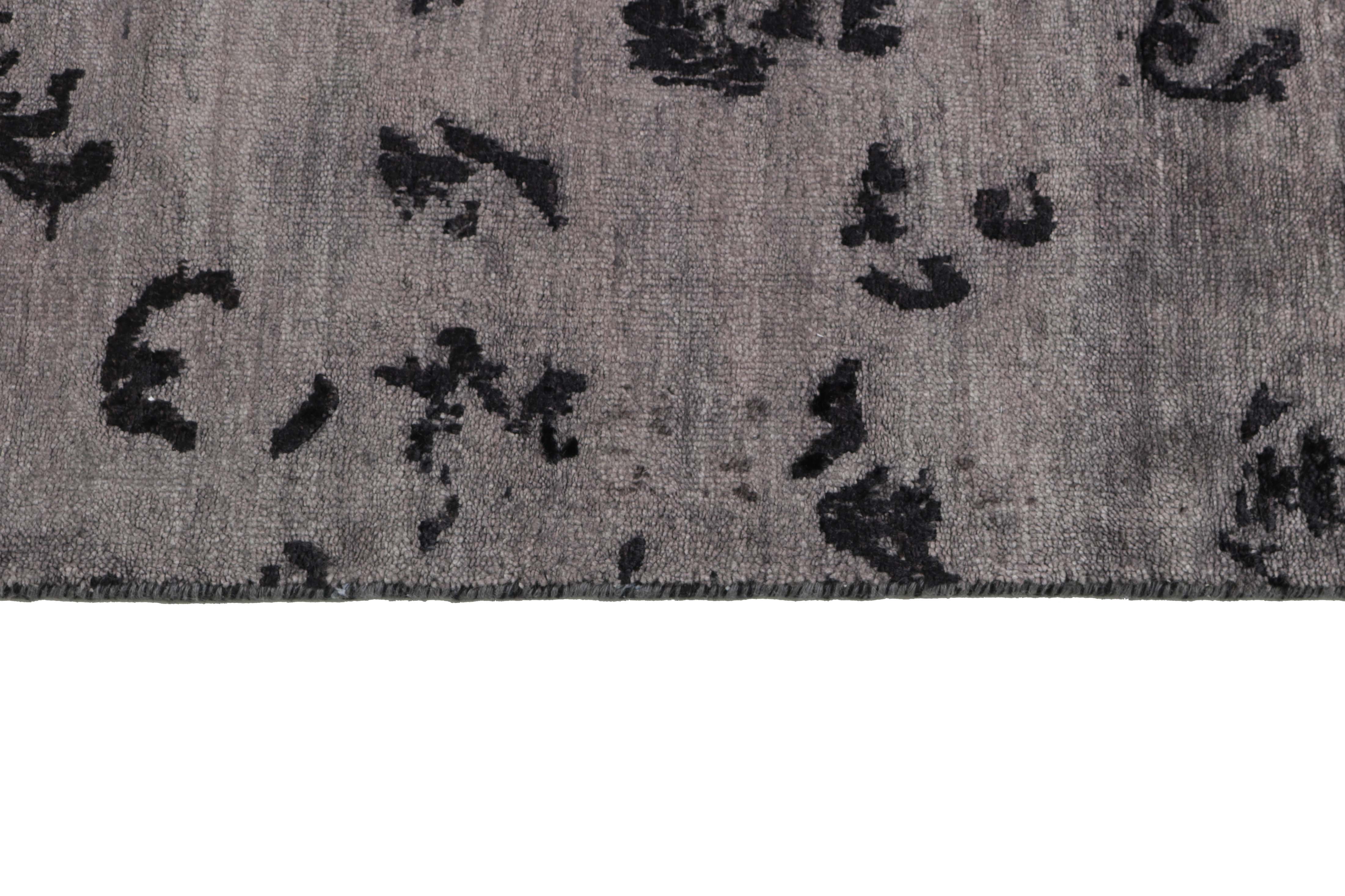 Authentic oriental rug with a damask pattern in grey