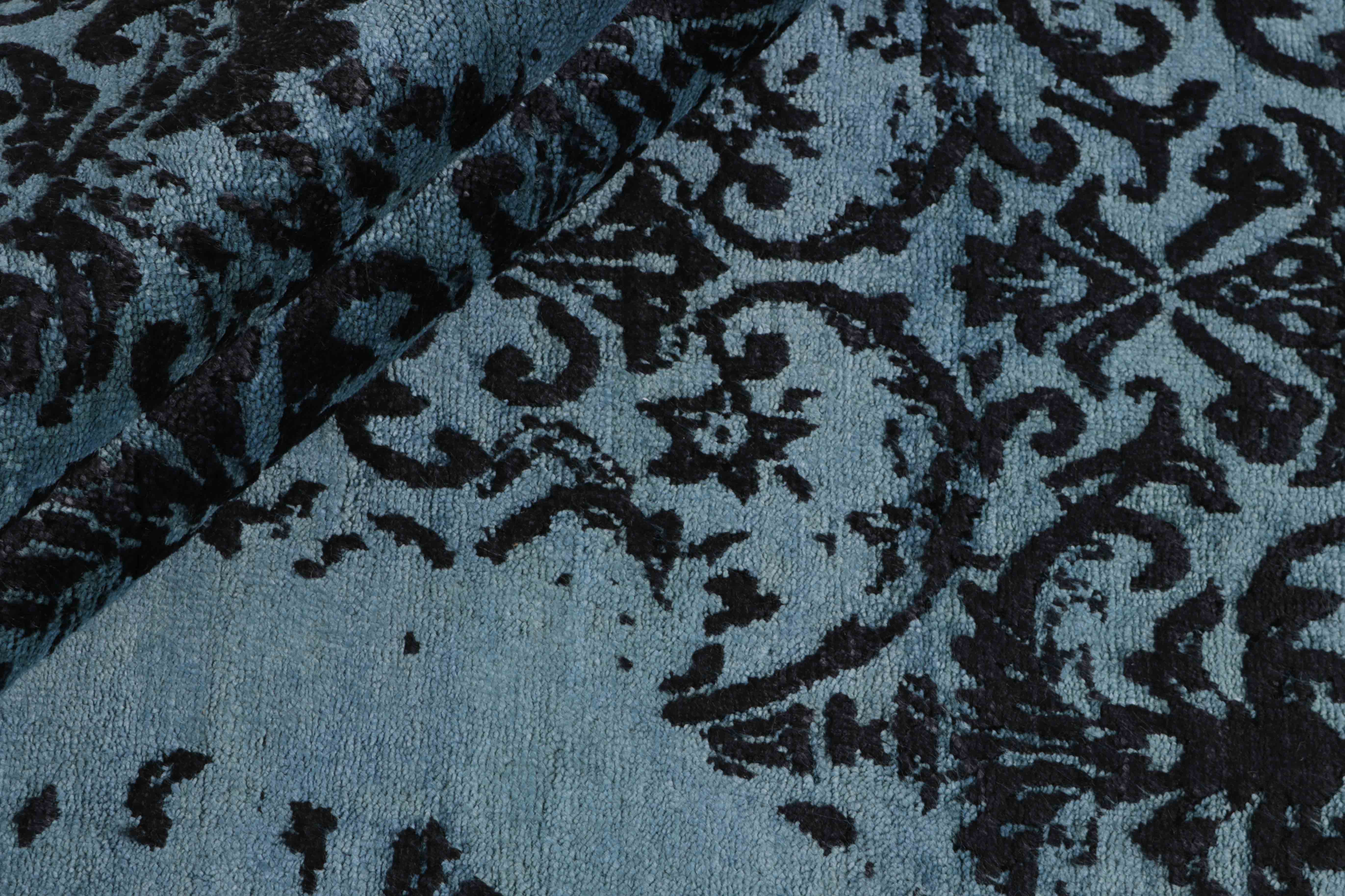 Authentic oriental rug with a damask pattern in blue