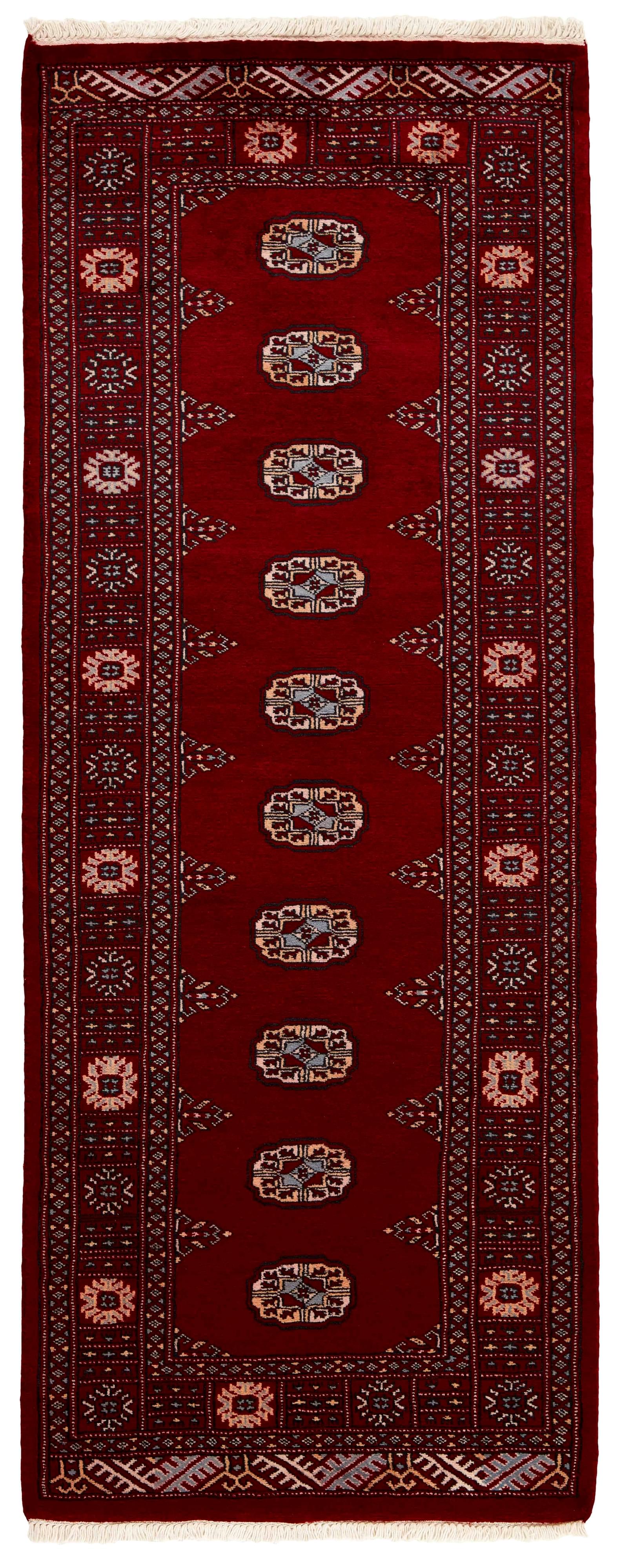 red oriental runner with traditional gul pattern