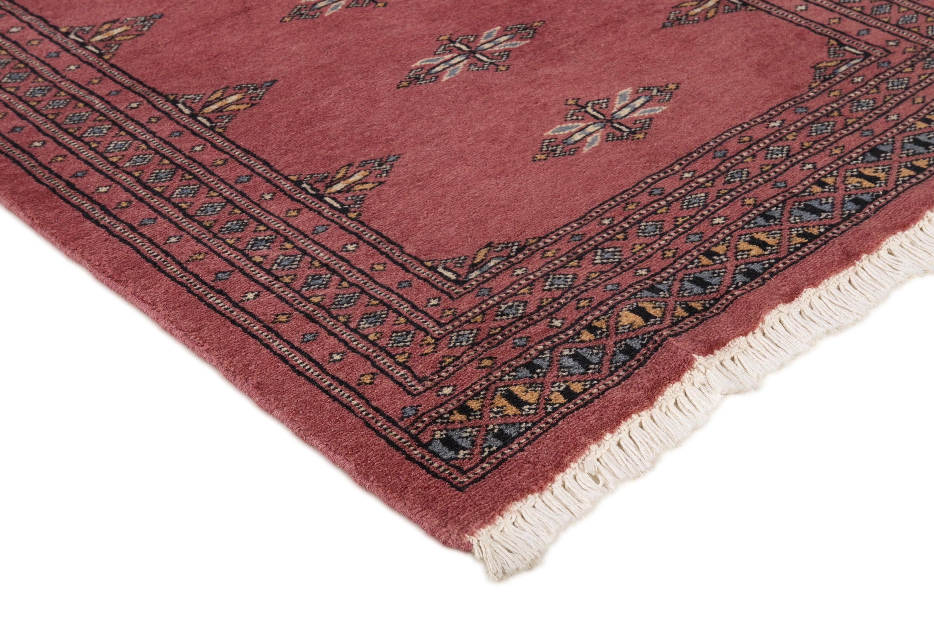 Red Oriental runner with traditional bordered pattern