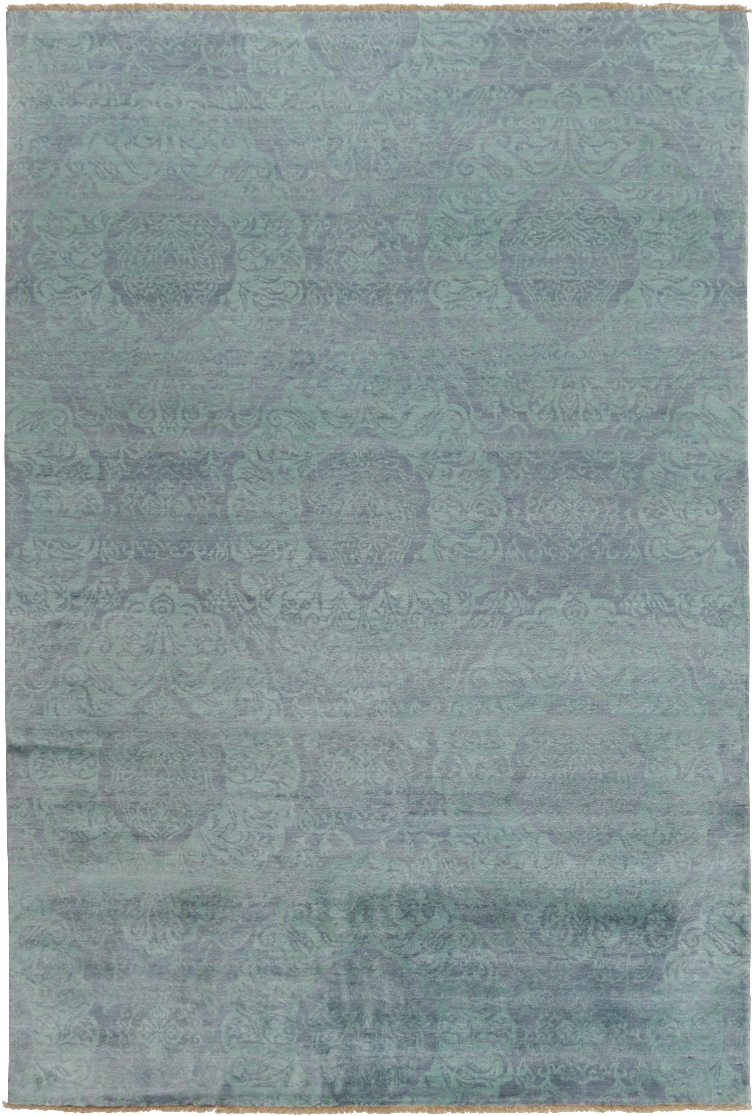 Authentic oriental rug with a damask pattern in blue