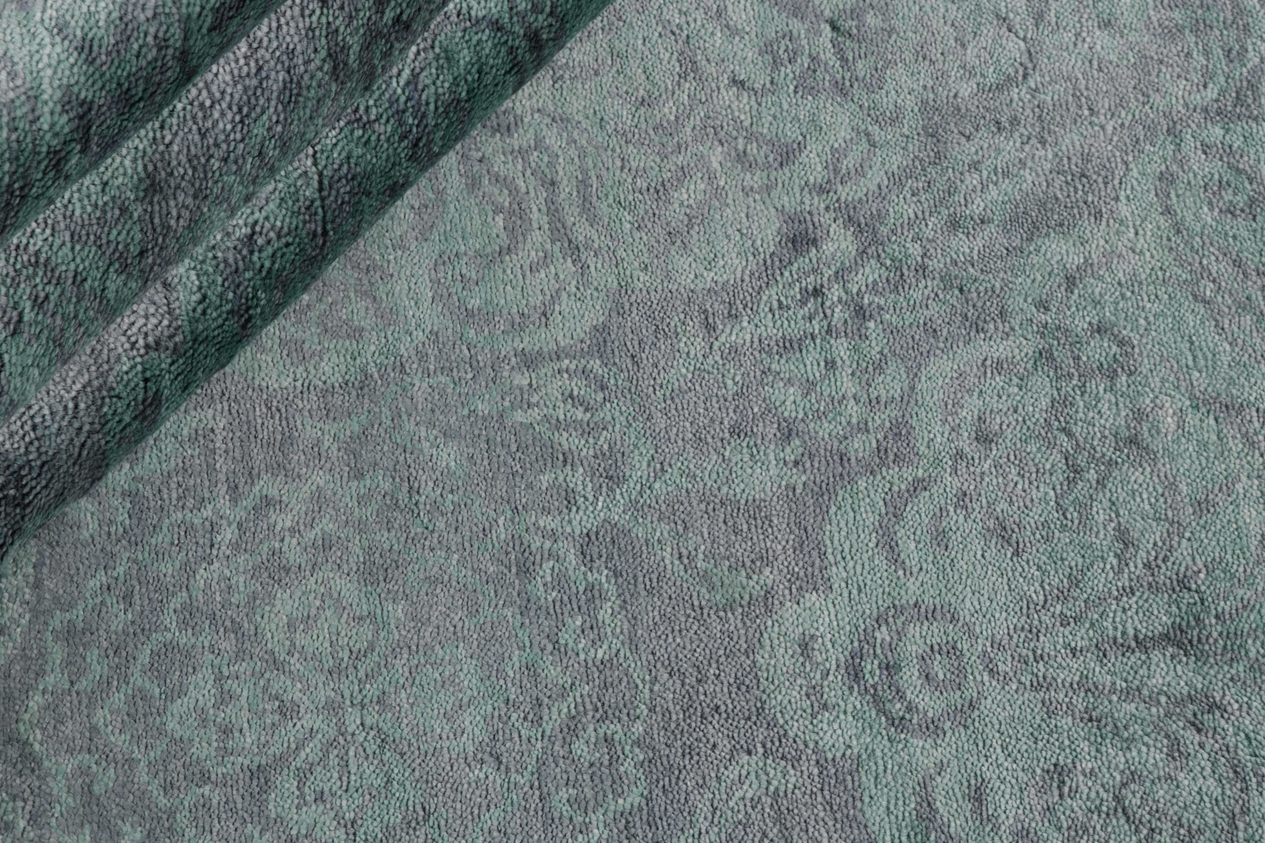 Authentic oriental rug with a damask pattern in blue