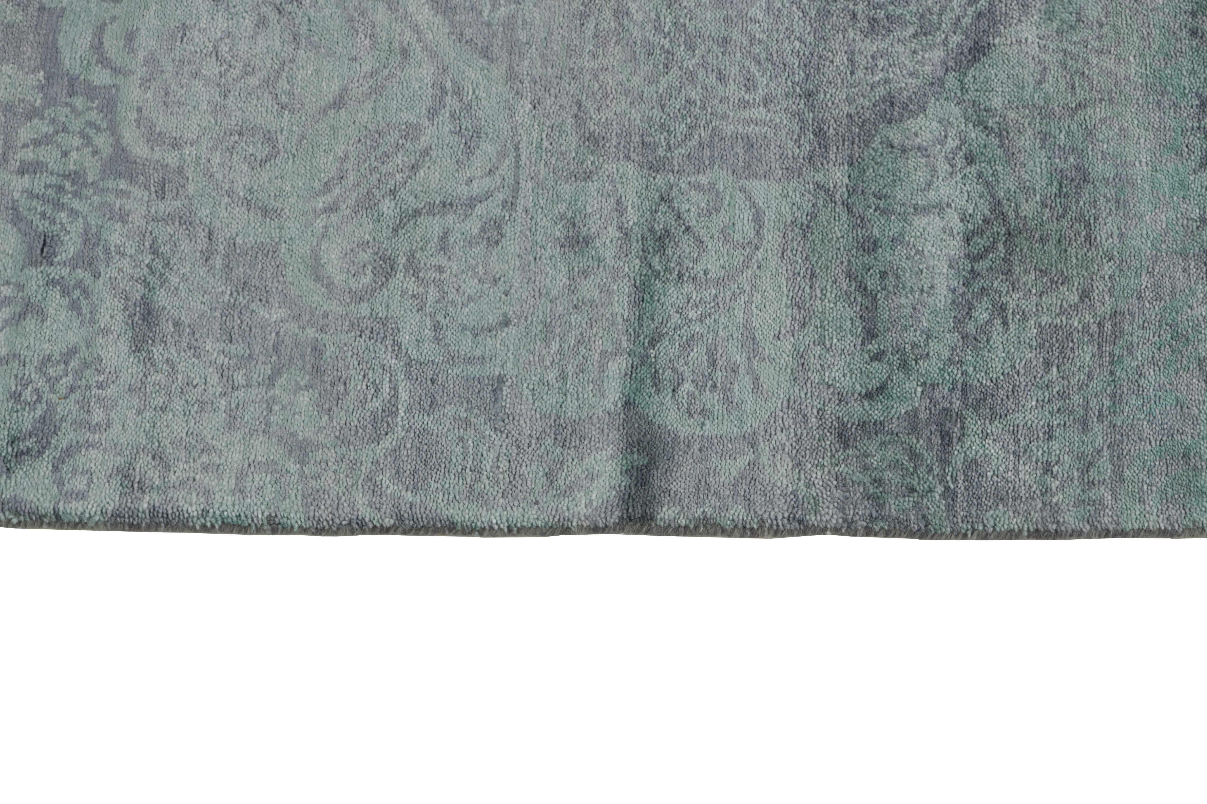 Authentic oriental rug with a damask pattern in blue