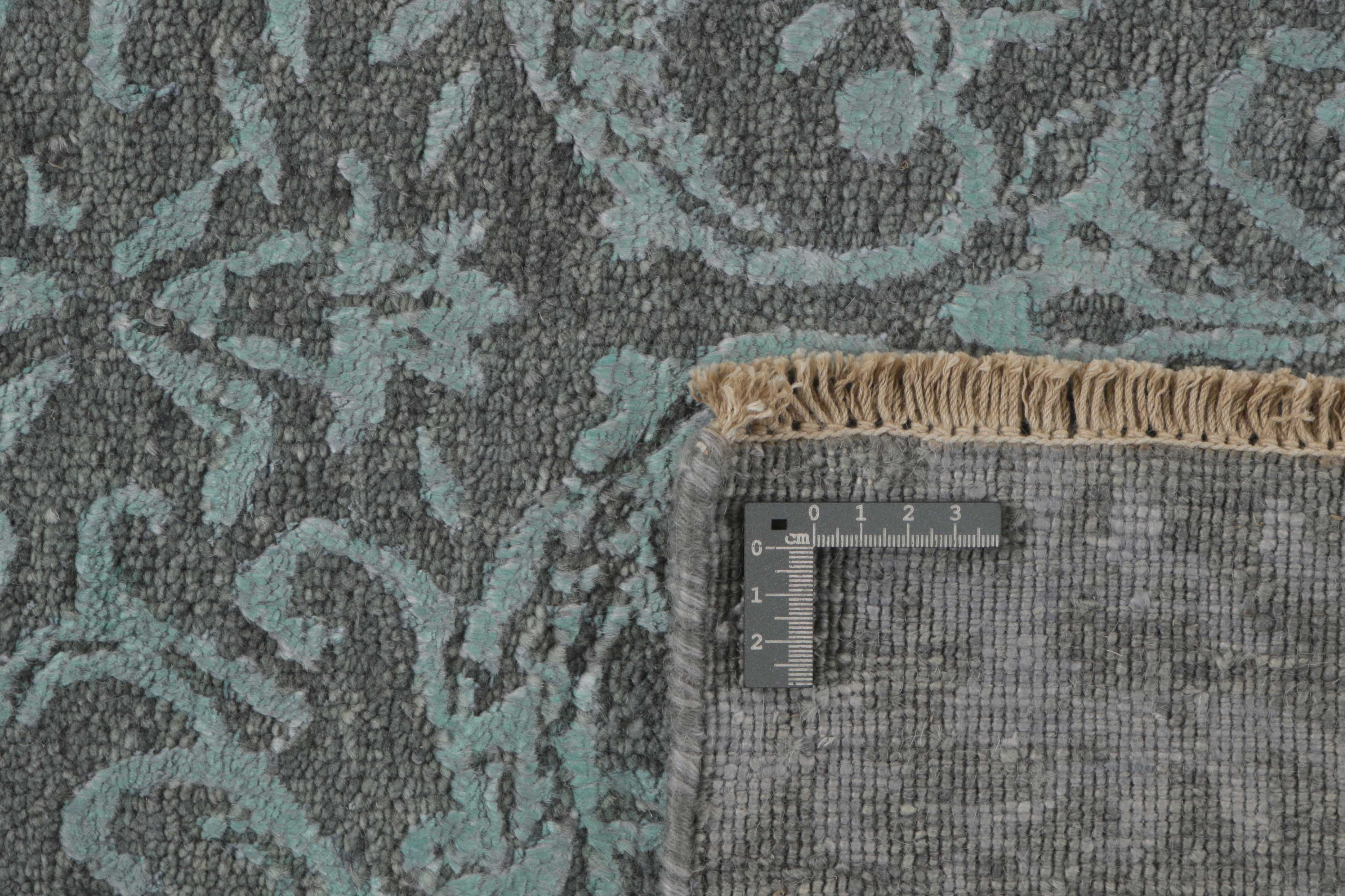 Authentic oriental rug with a damask pattern in blue