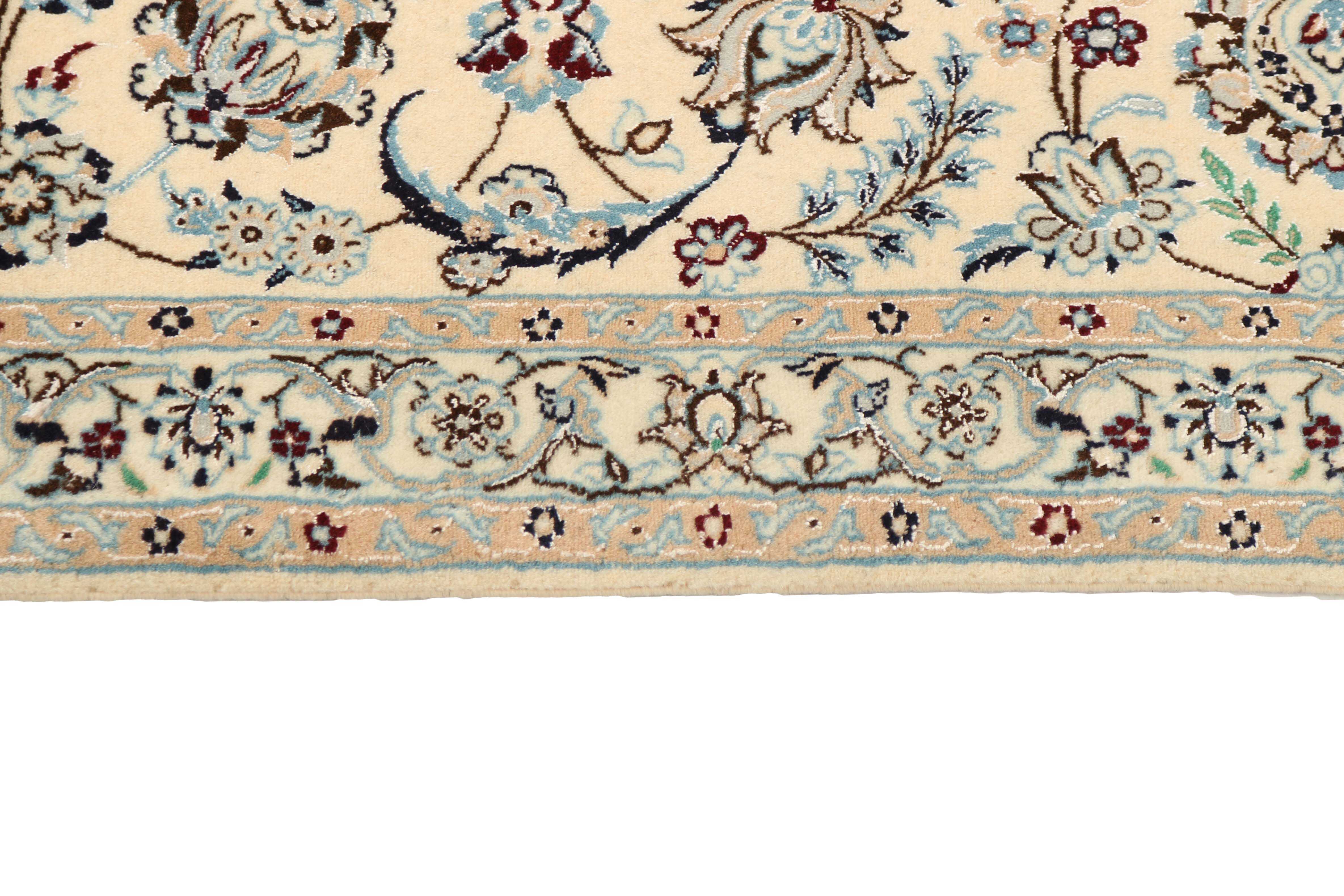 Authentic oriental rug with traditional floral design in cream and blue