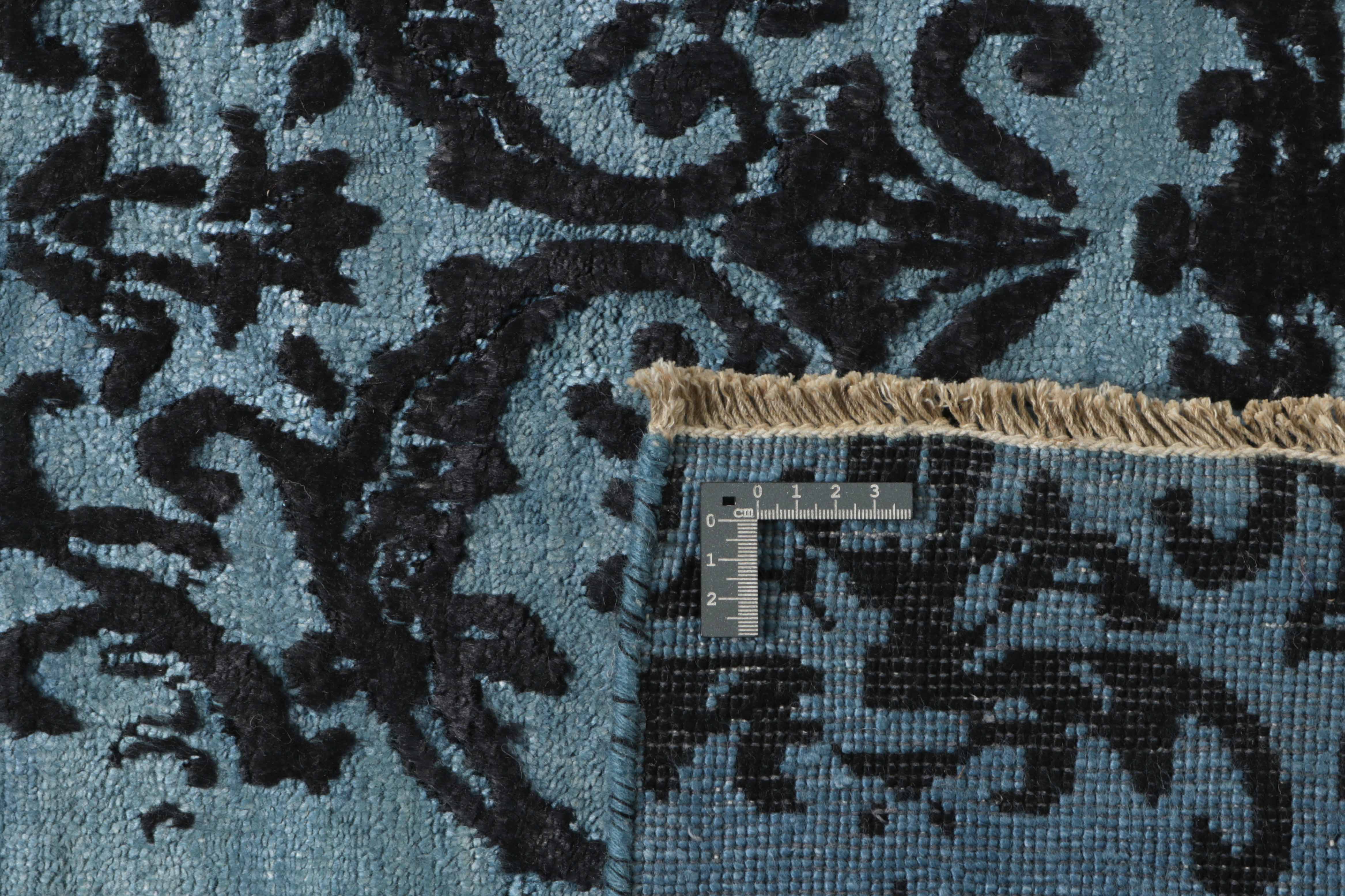 Authentic oriental rug with a damask pattern in blue