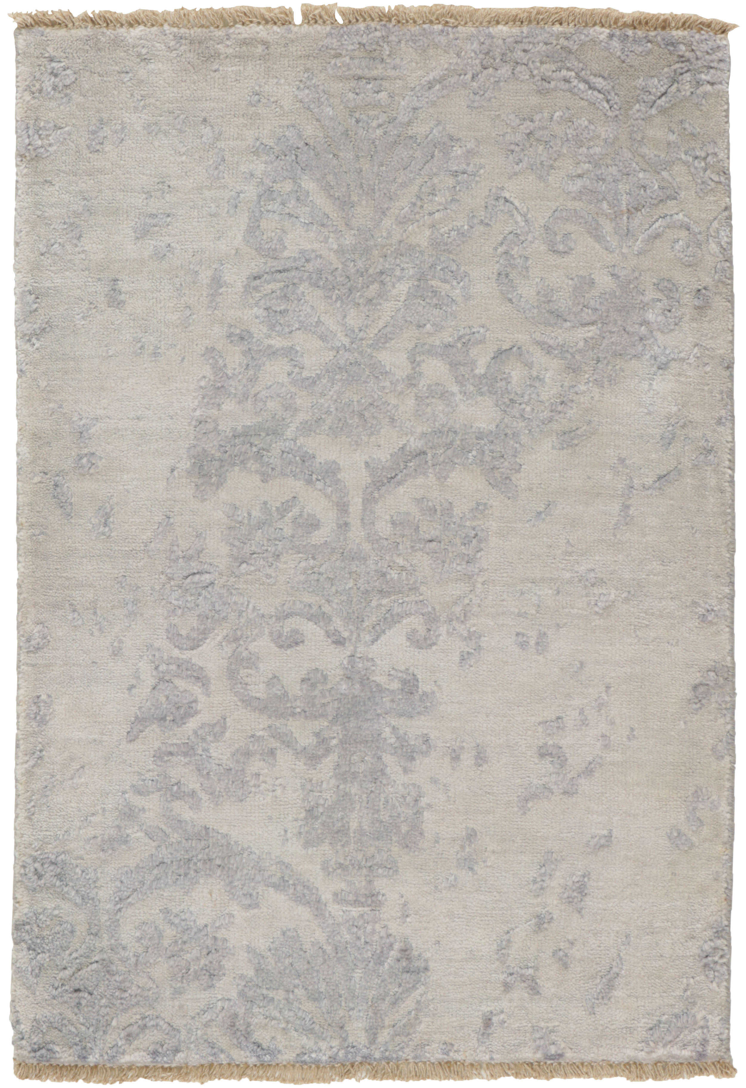 Authentic oriental rug with a damask pattern in blue