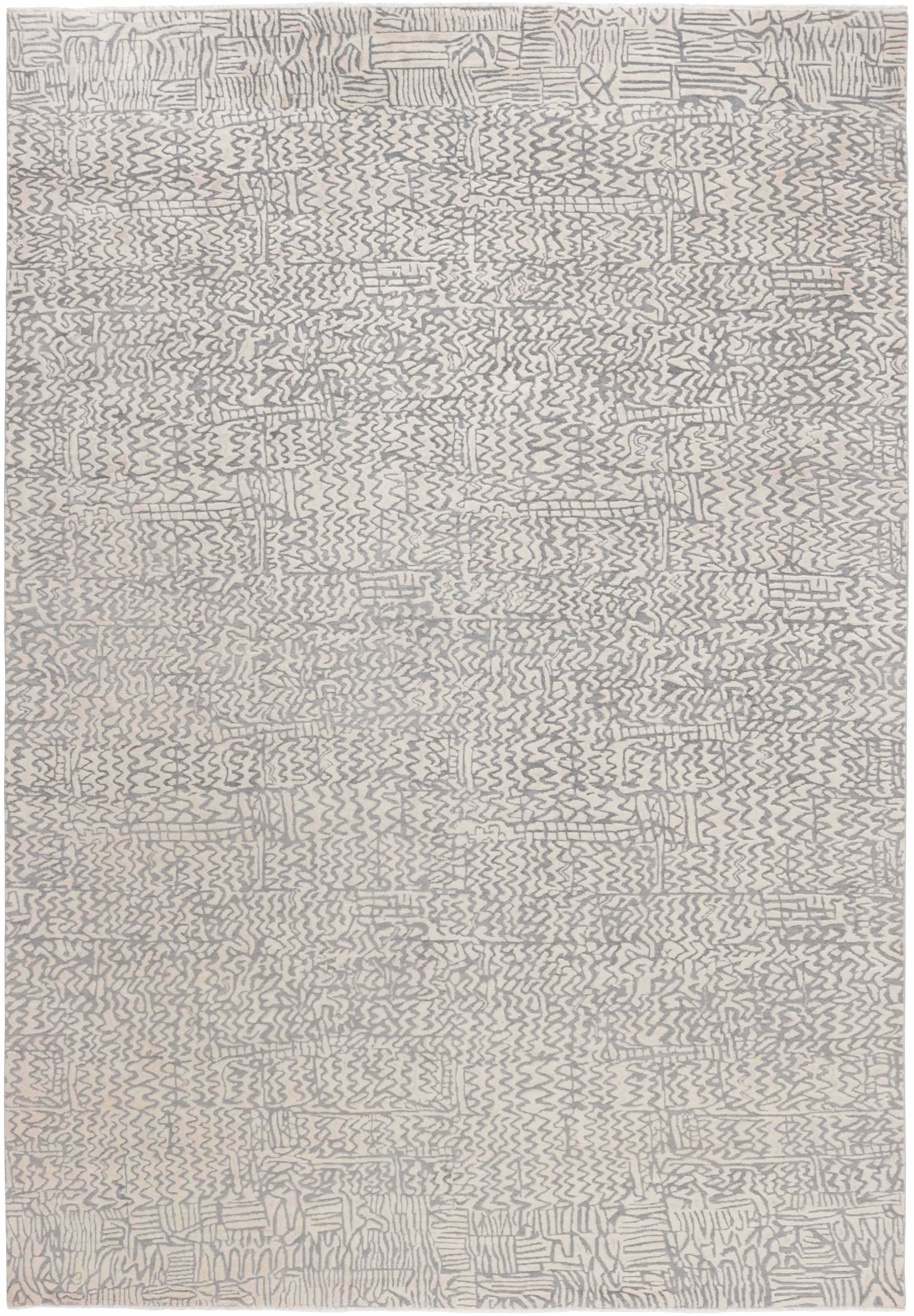Authentic oriental rug with a damask pattern in beige