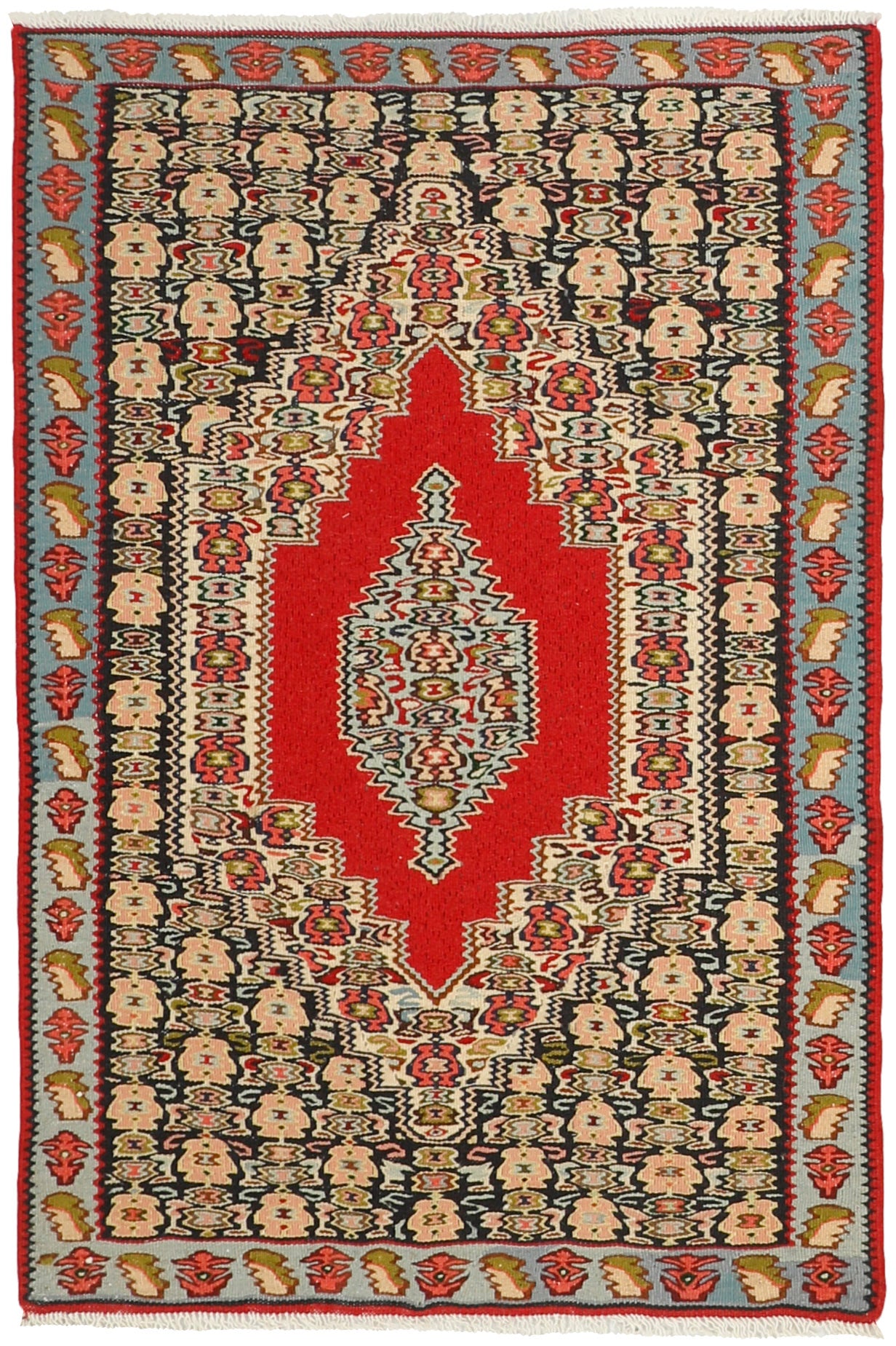Rectangular natural beige rug with terracotta red, grey and black aztec design and black tassel border