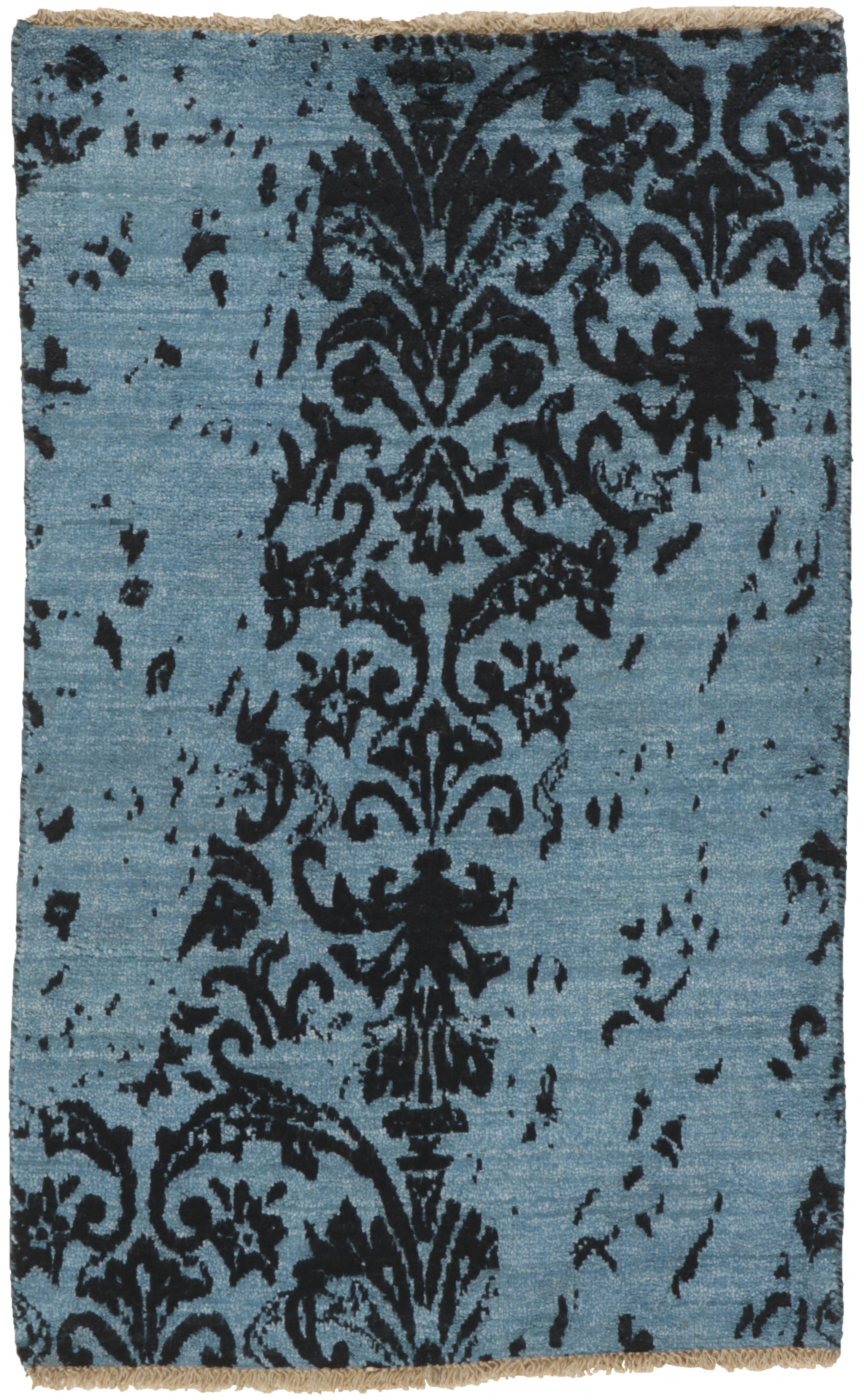 Authentic oriental rug with a damask pattern in blue and black