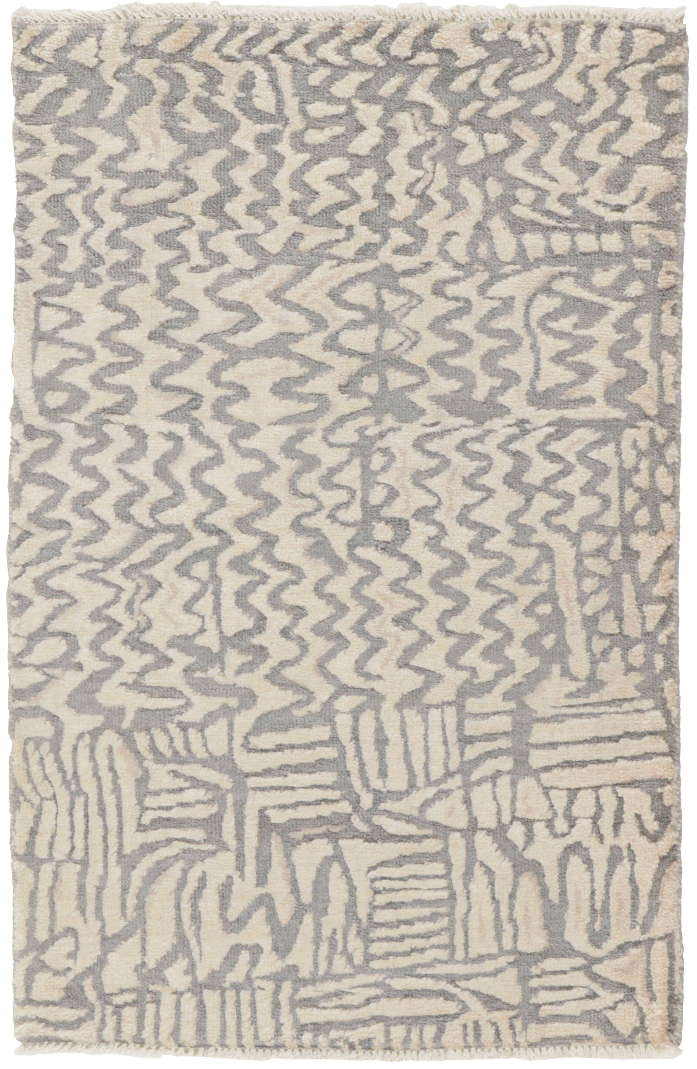 Authentic oriental rug with a damask pattern in beige and ivory