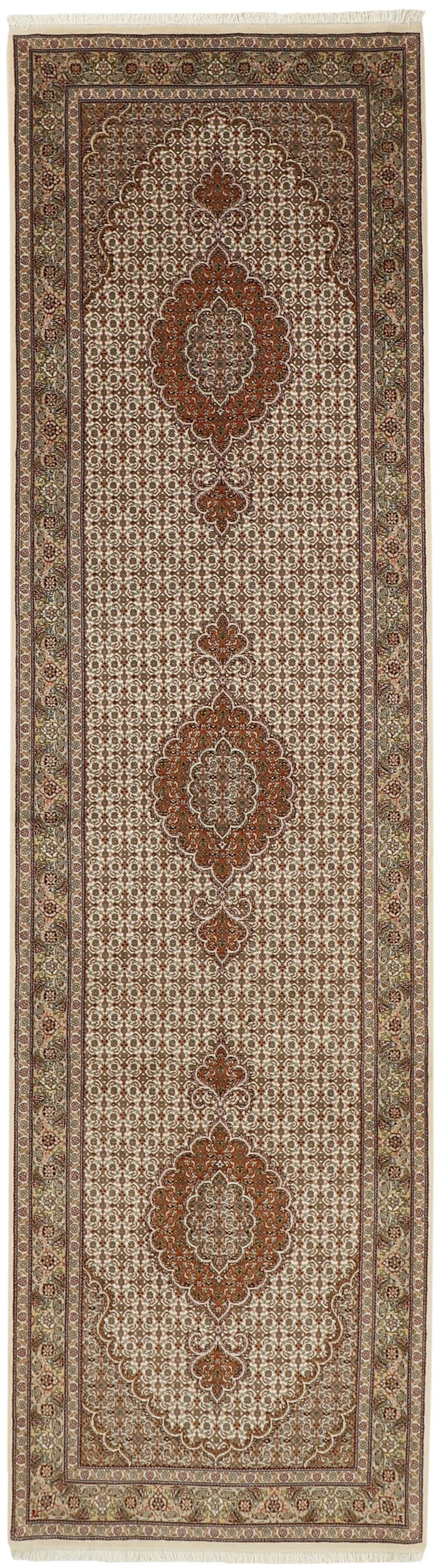 Authentic persian runner with traditional floral design in red, beige and brown