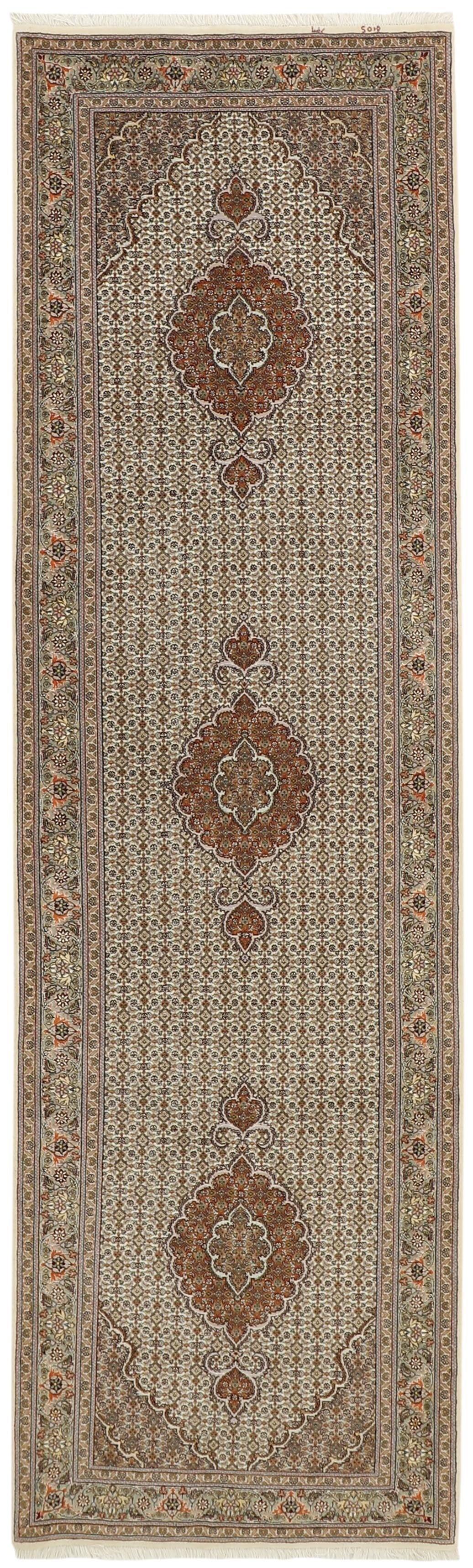Authentic persian runner with traditional floral design in red, beige and brown
