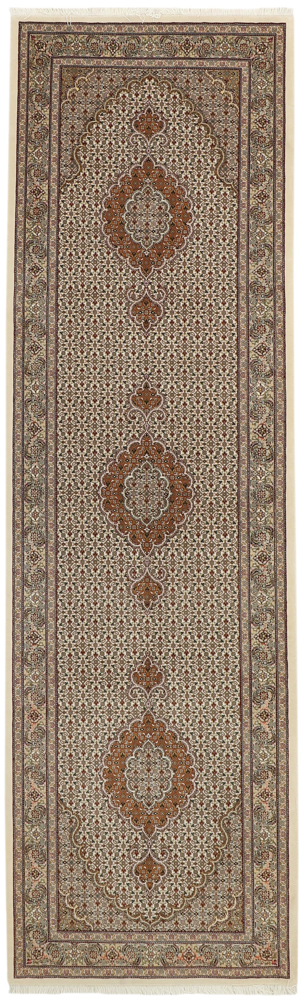 Authentic oriental rug with traditional floral design in beige