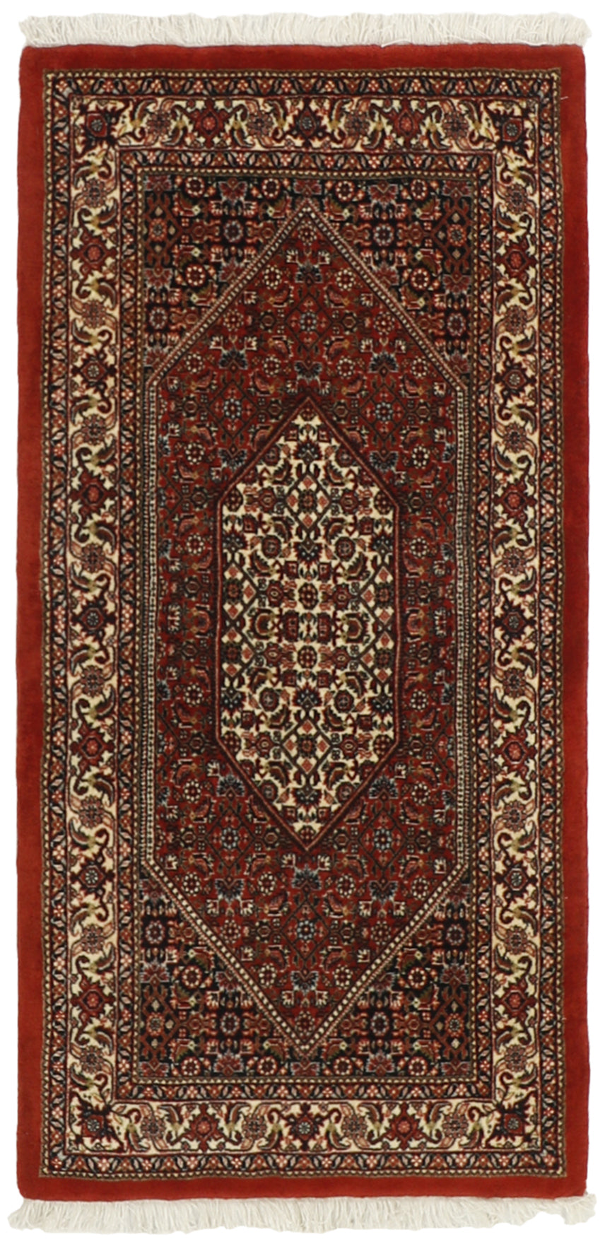 Red and cream persian rug with traditional floral design