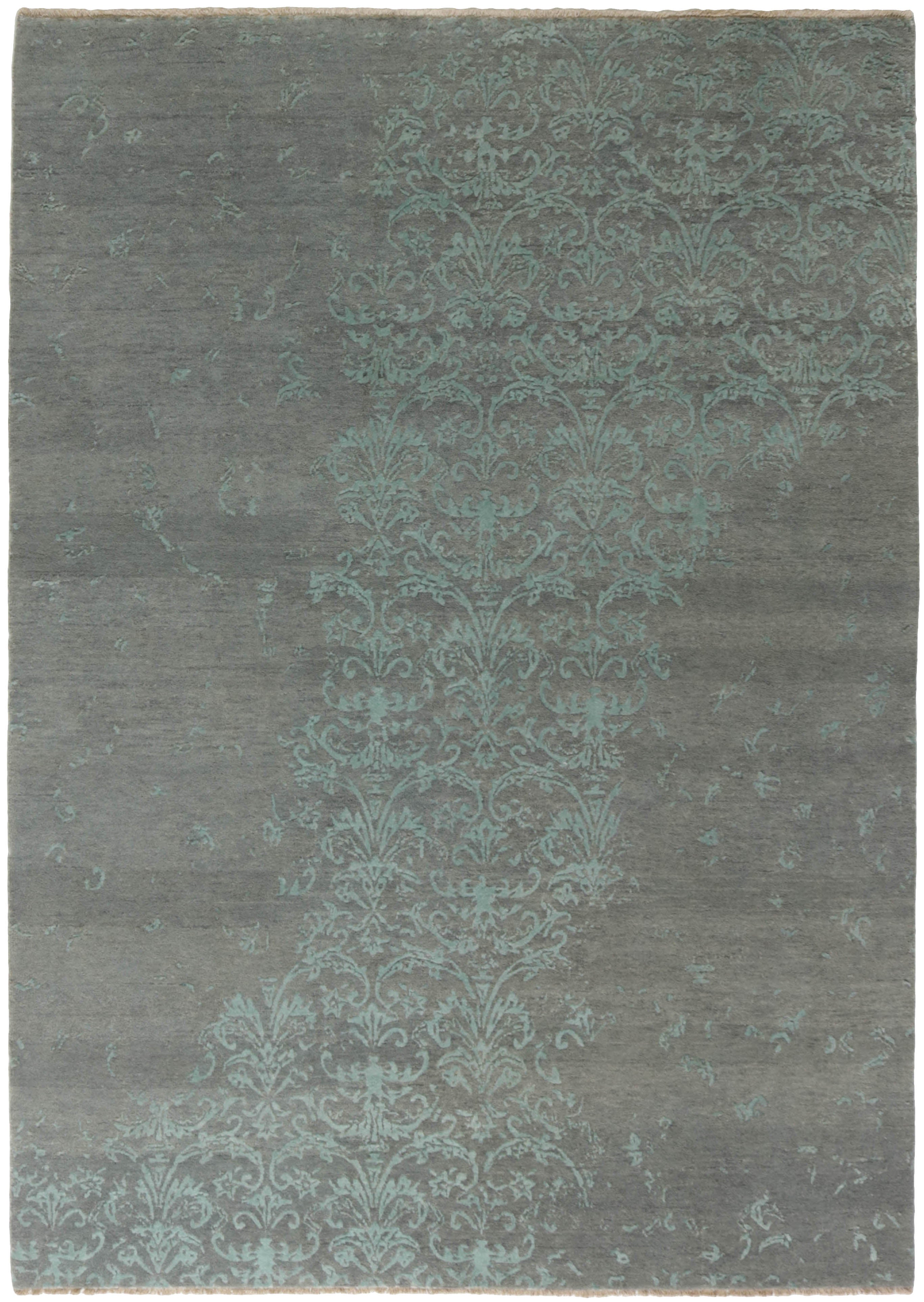 Authentic oriental rug with a damask pattern in blue