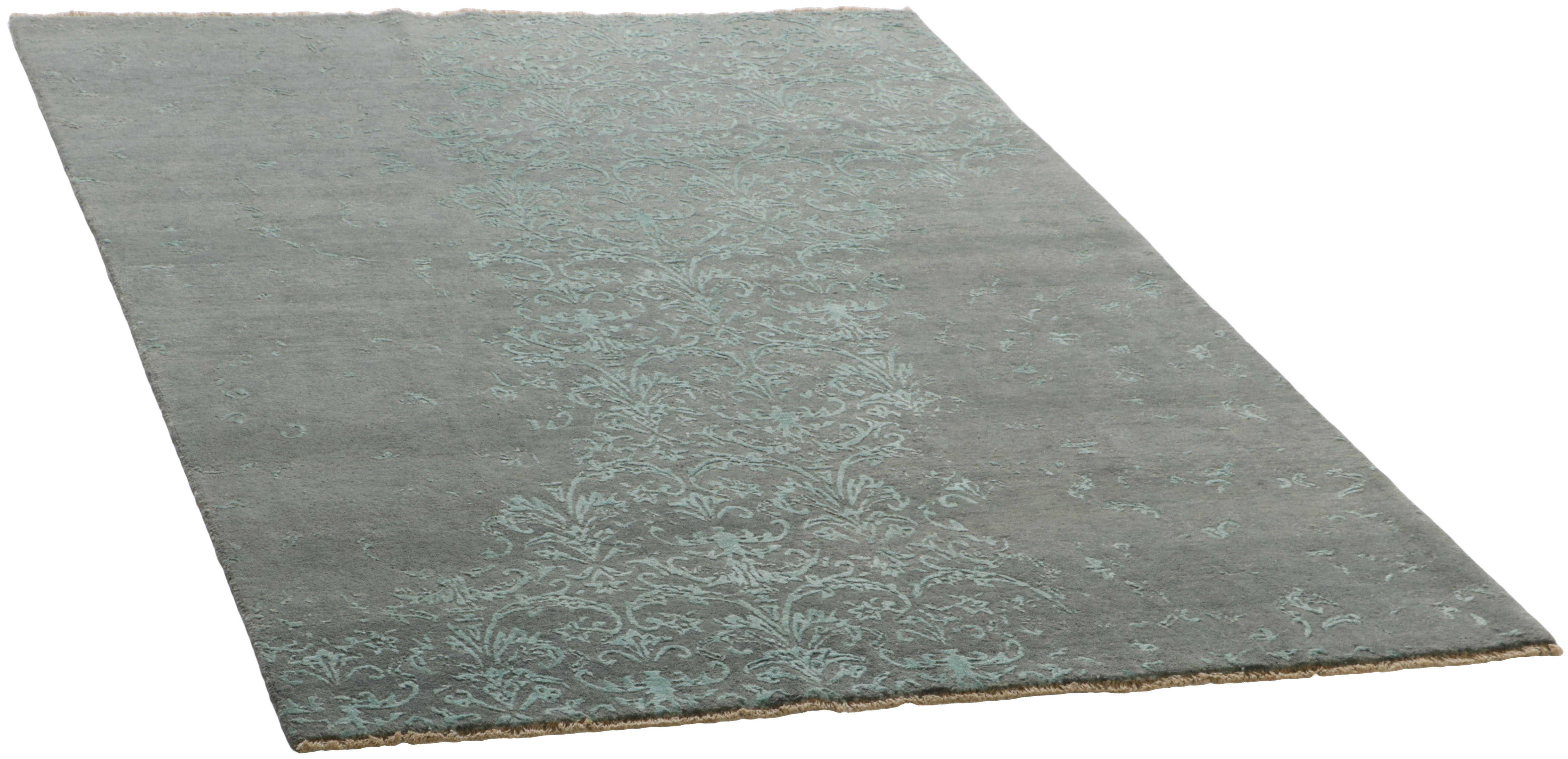 Authentic oriental rug with a damask pattern in blue