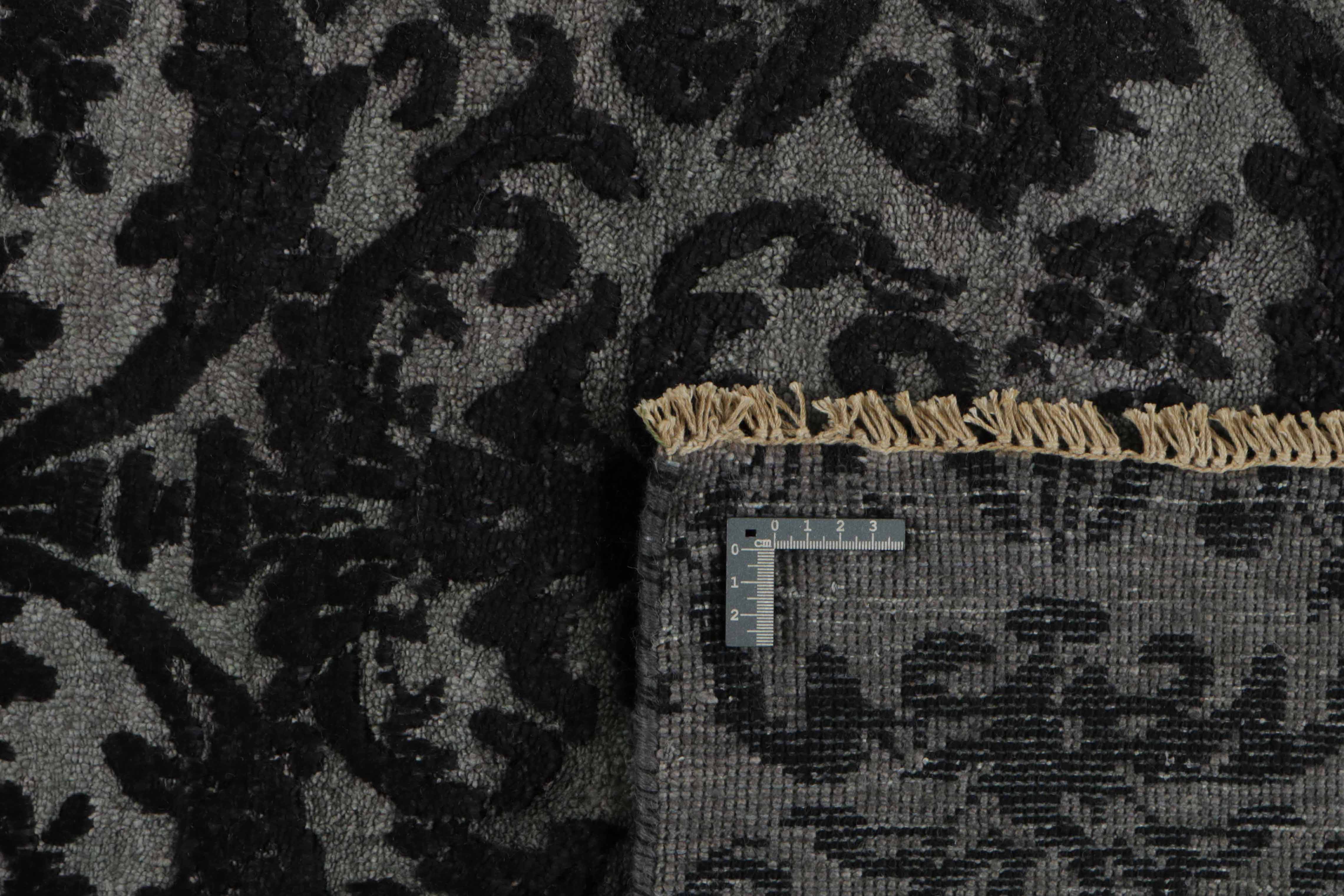 Authentic oriental rug with a damask pattern in blue
