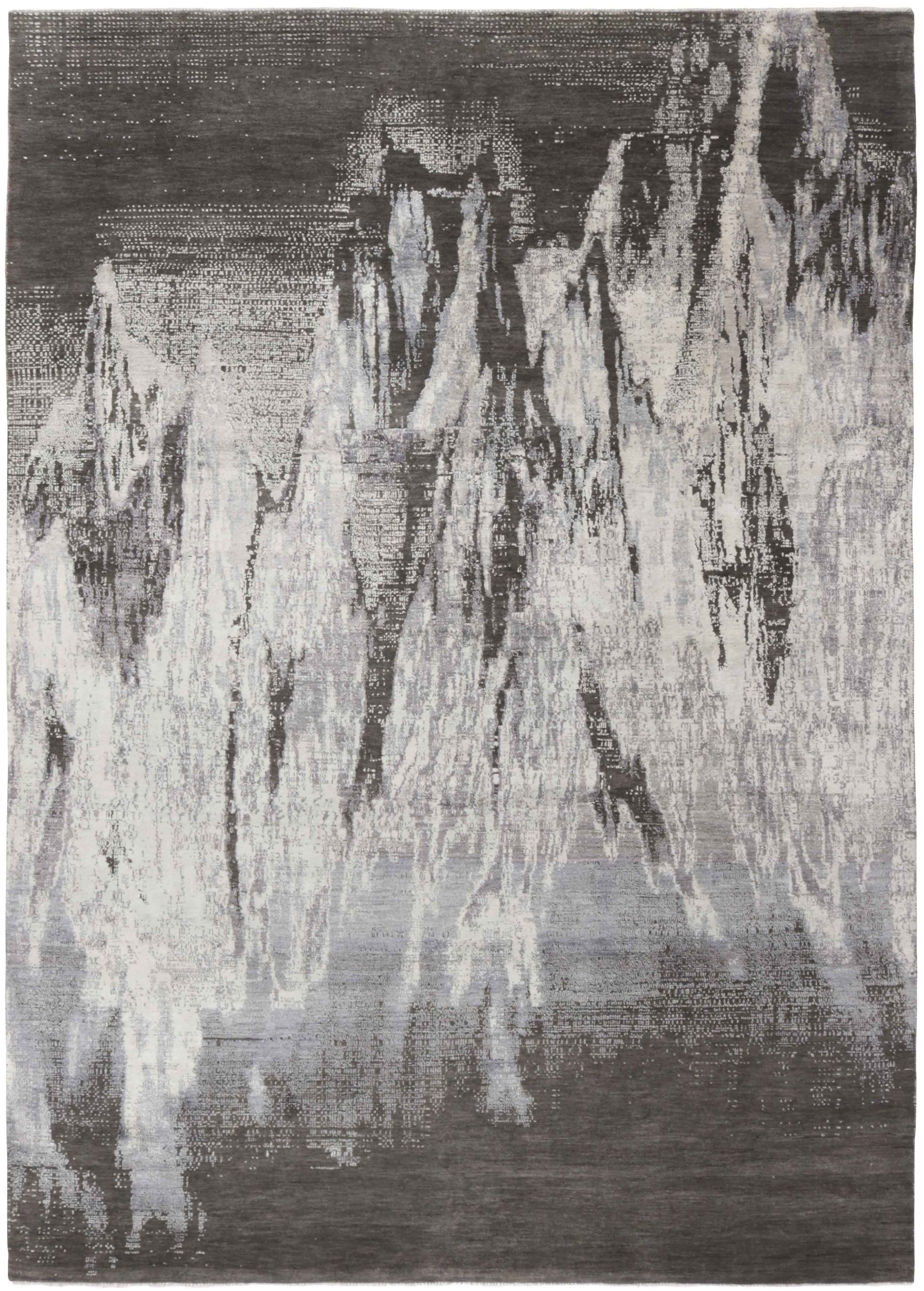 Large area rug with abstract design in grey and taupe