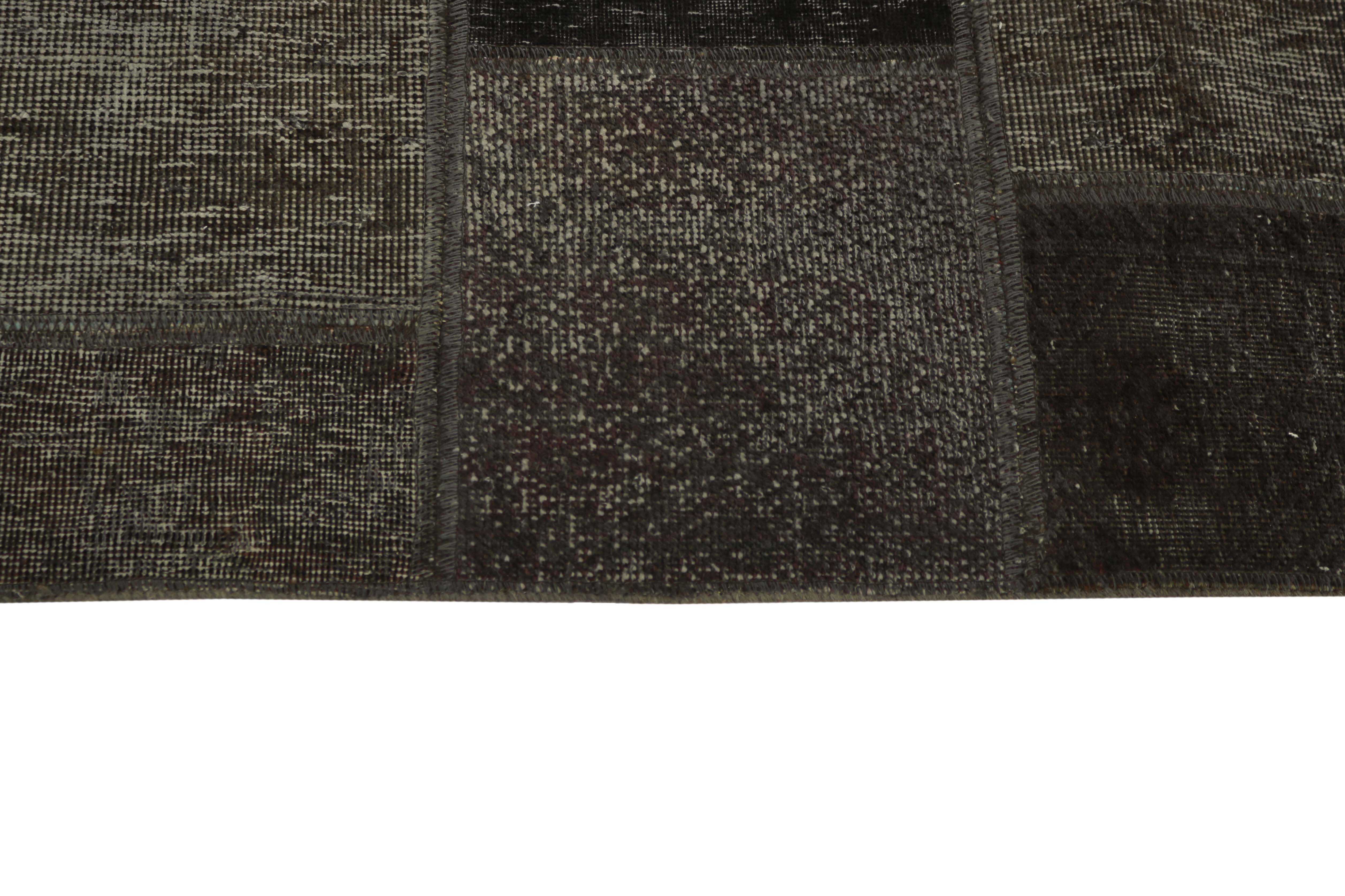 Authentic black patchwork persian rug