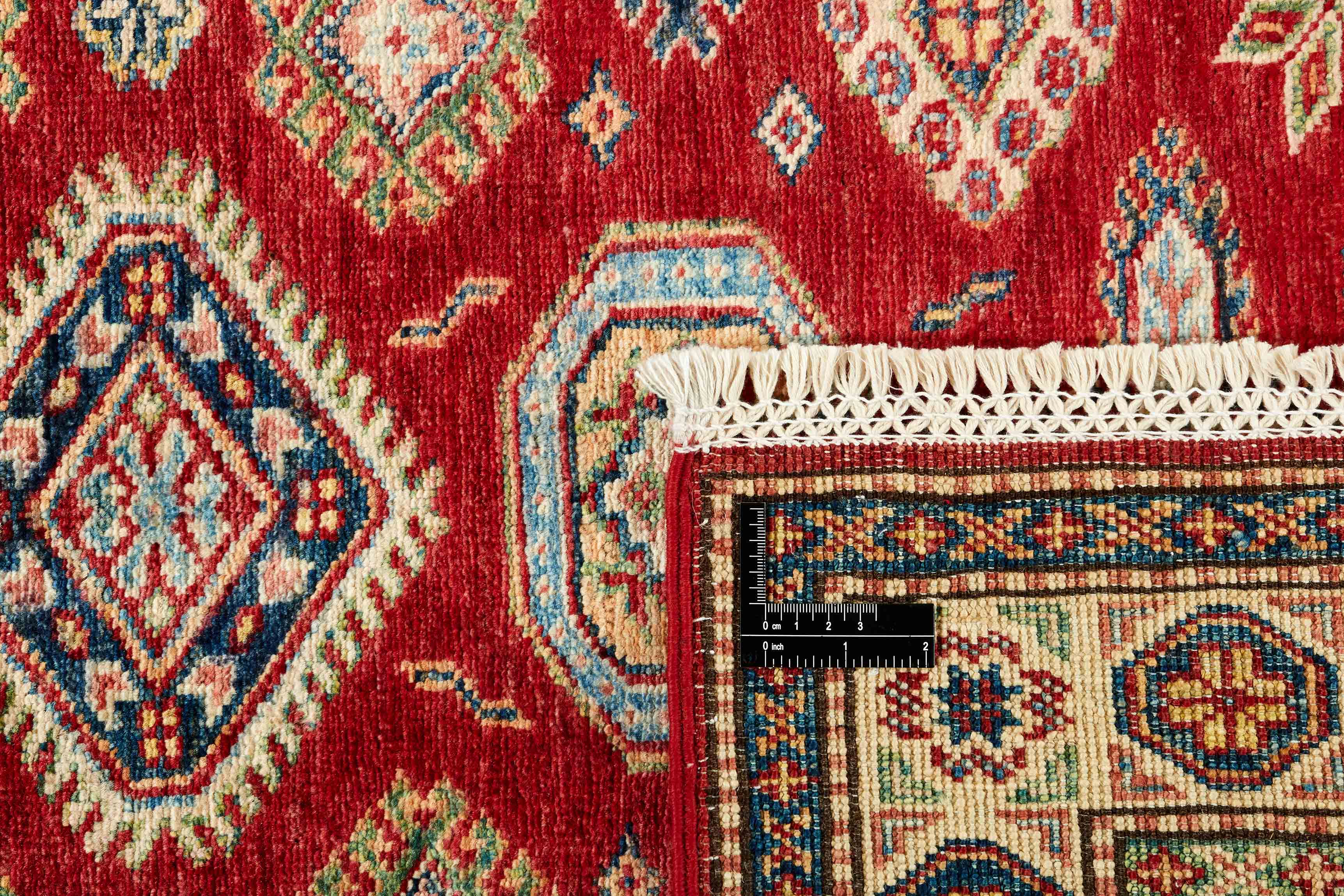 Authentic oriental rug with red and black traditional geometric design