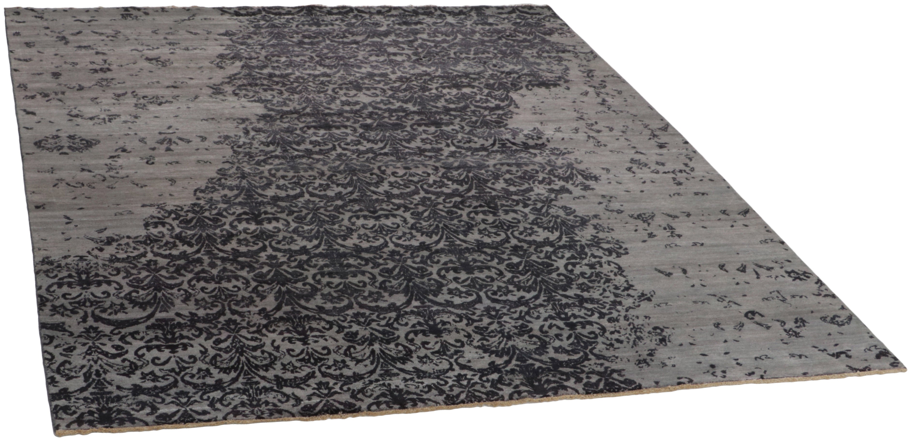 Authentic oriental rug with a damask pattern in grey