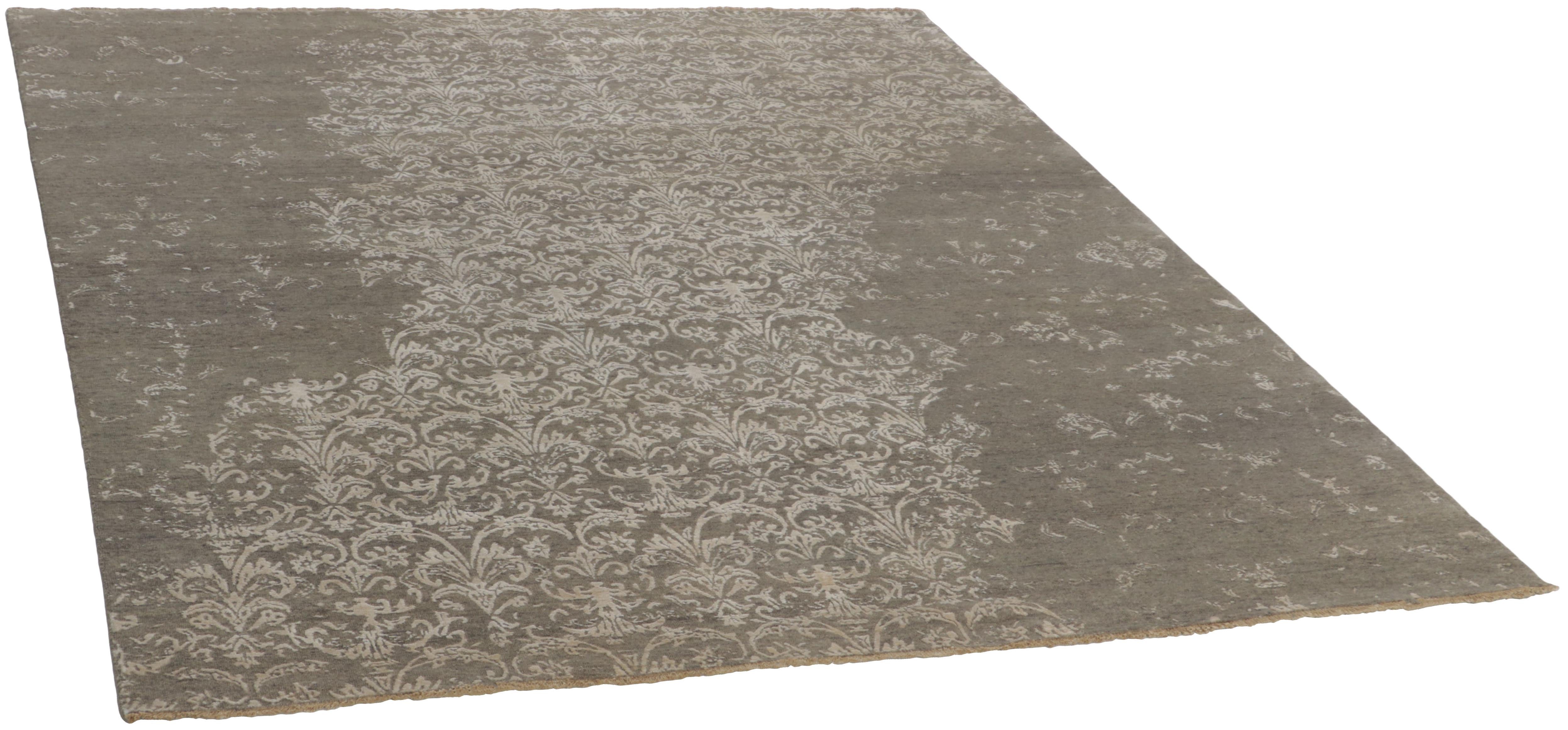 Authentic oriental rug with a damask pattern in beige