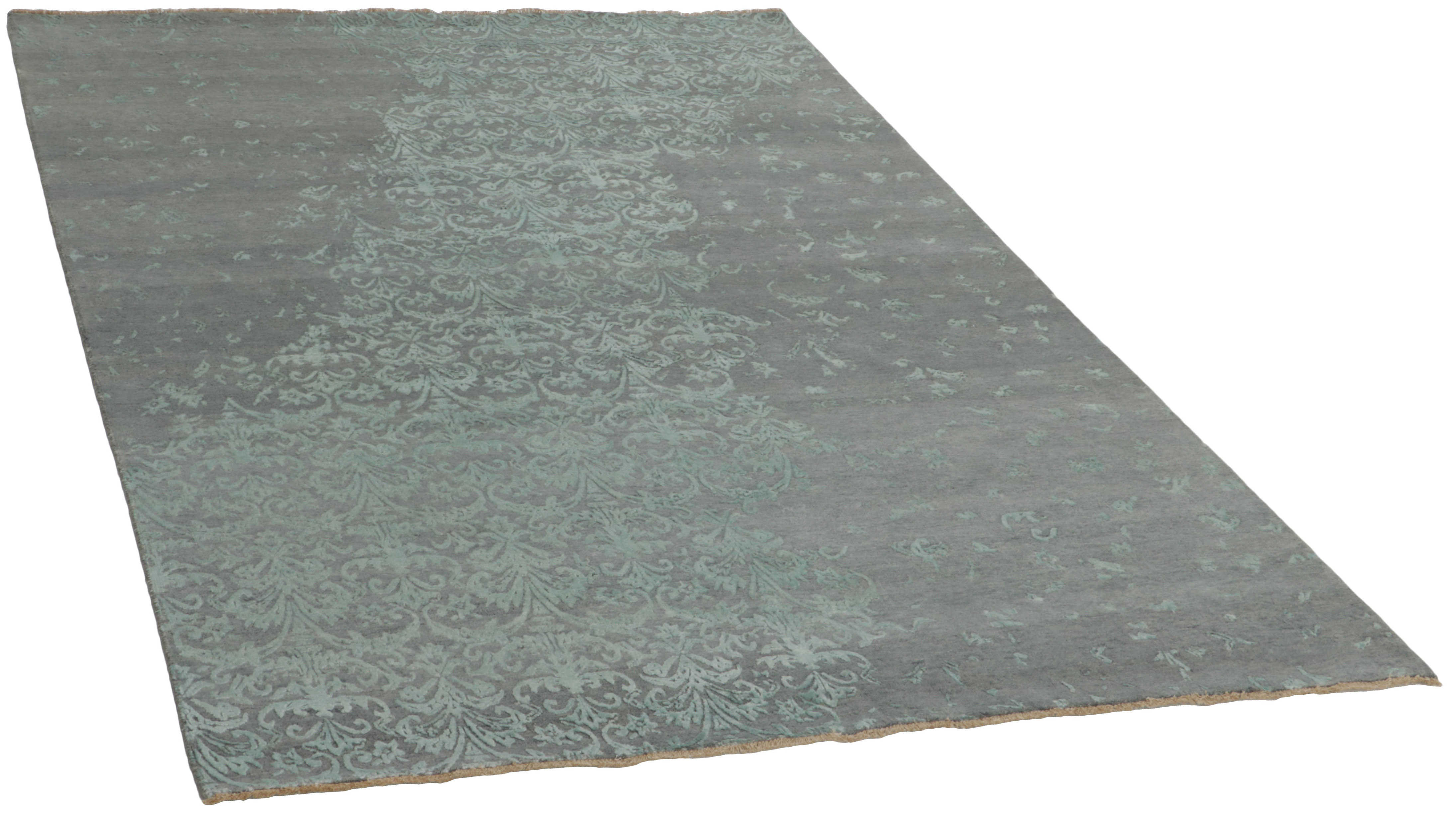 Genuine oriental rug with a blue damask pattern