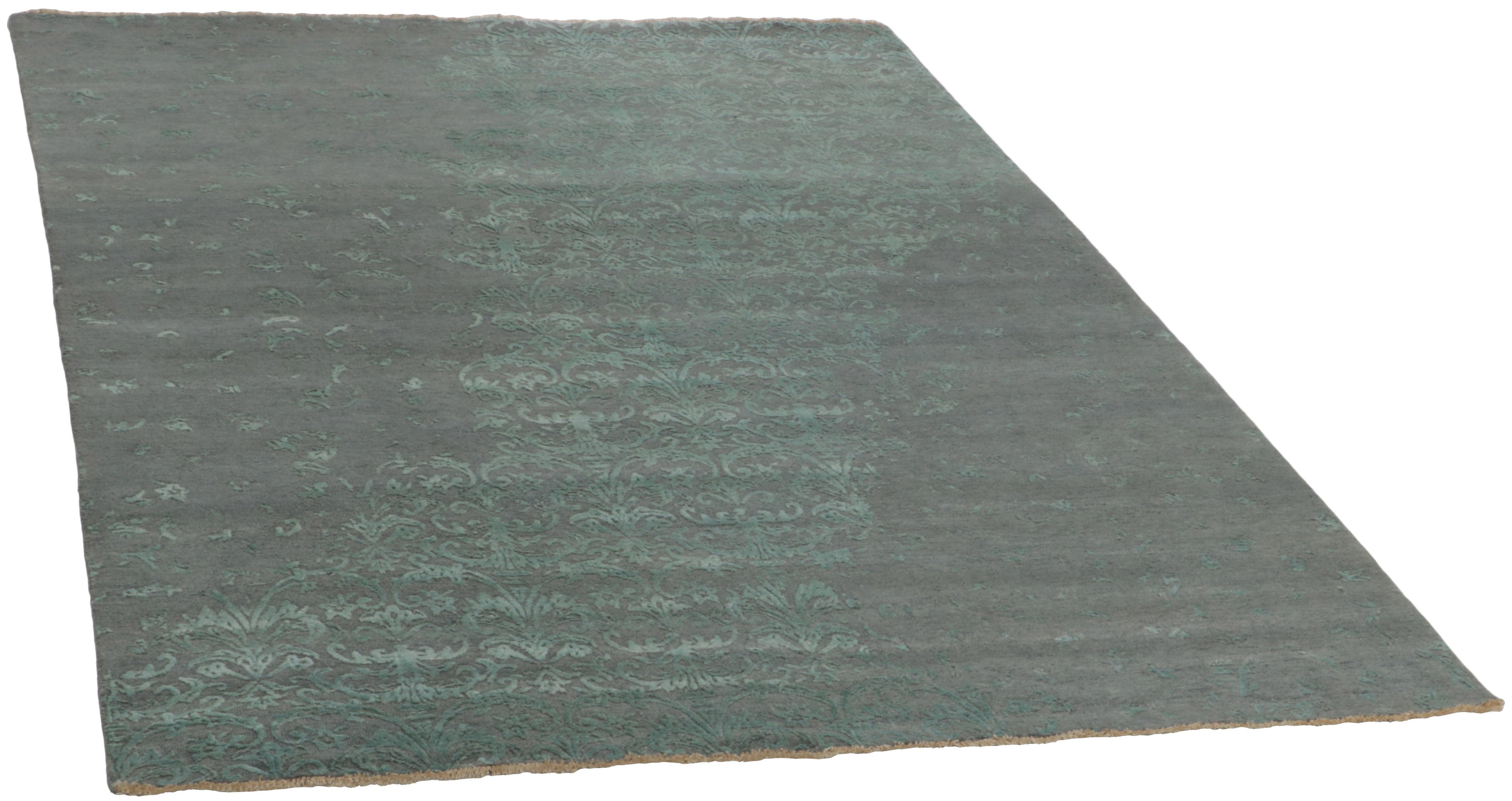 Genuine oriental rug with a blue damask pattern